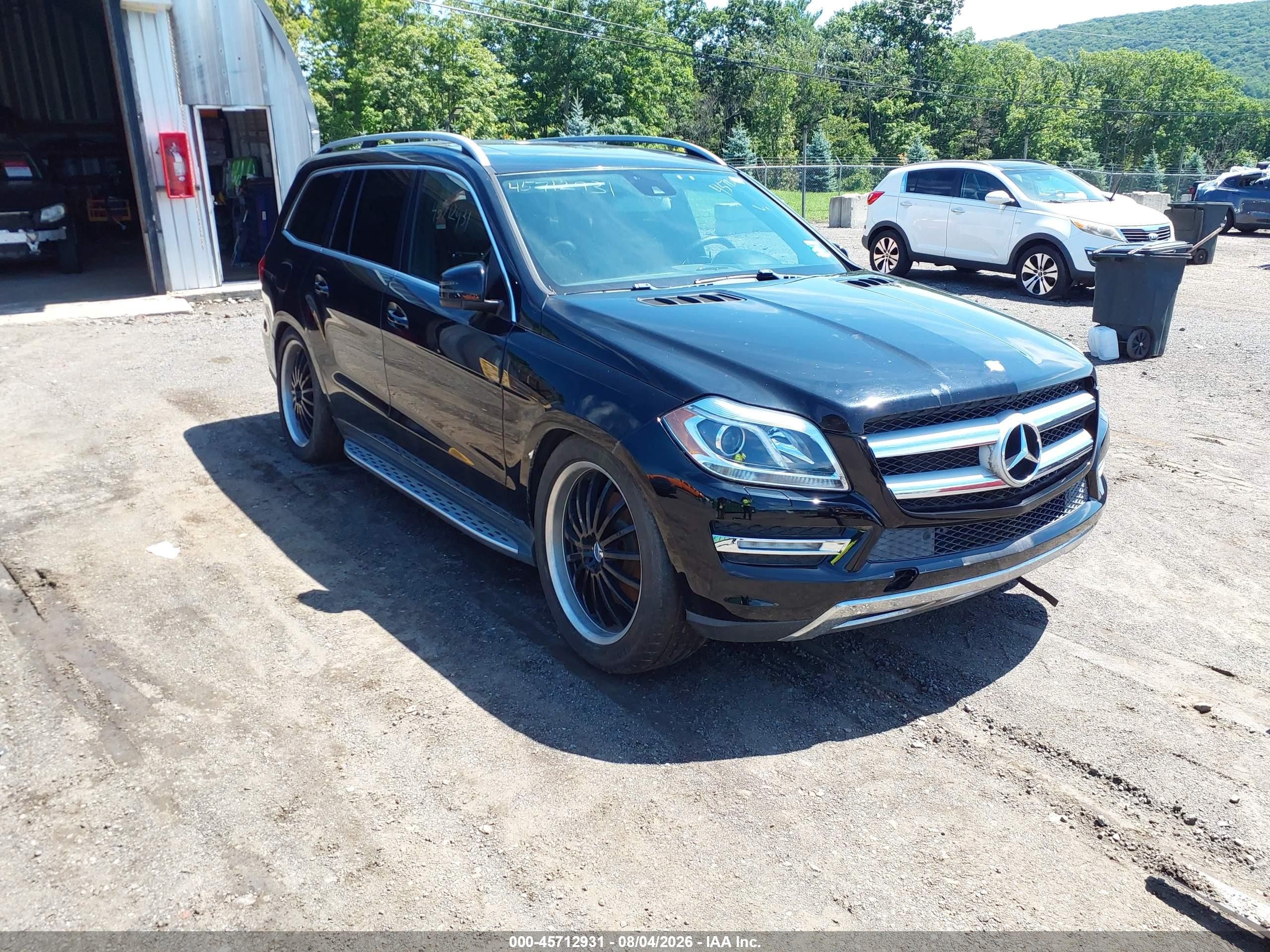 2013 Mercedes-Benz GL 450, VIN 4JGDF7CE5DA247977 — Normal wear