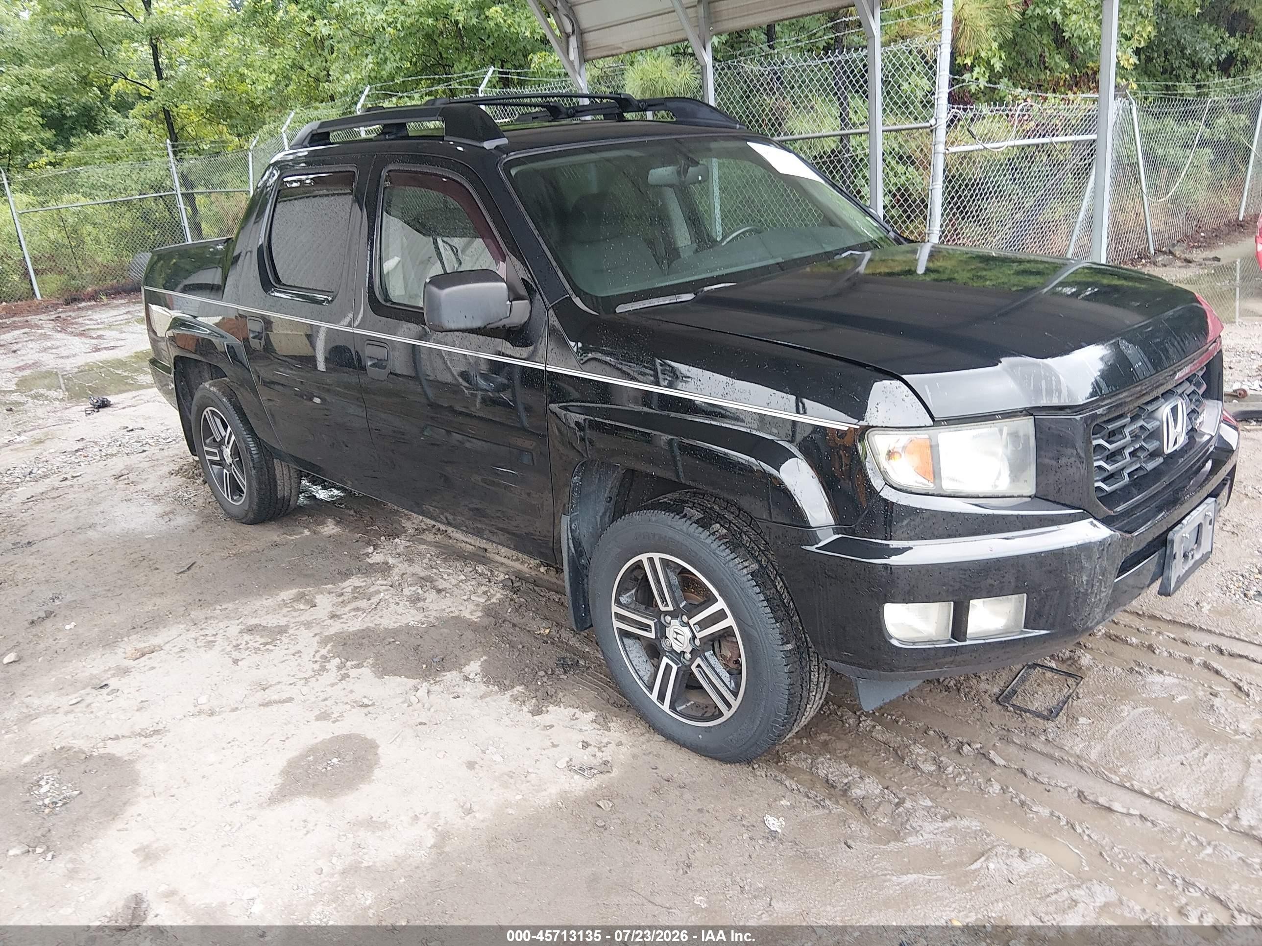 2014 Honda Ridgeline Sport, VIN 5FPYK1F78EB008760 — Normal wear