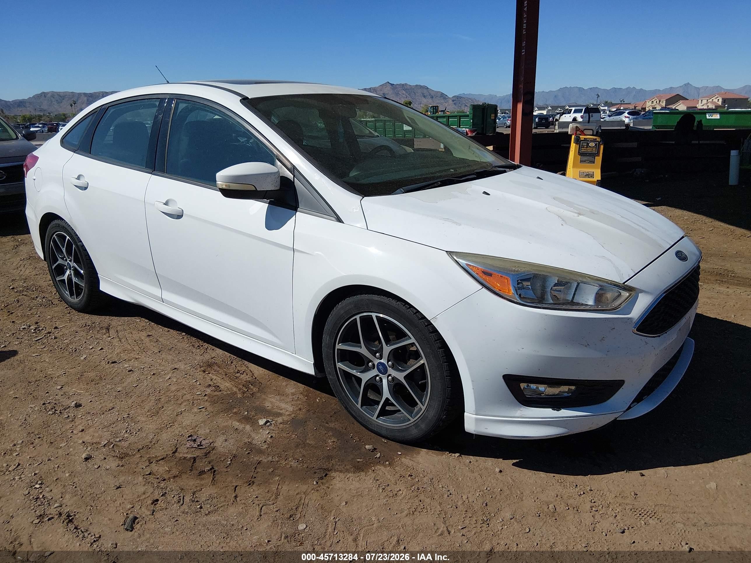 2015 Ford Focus SE, VIN 1FADP3F22FL382603 — Normal wear