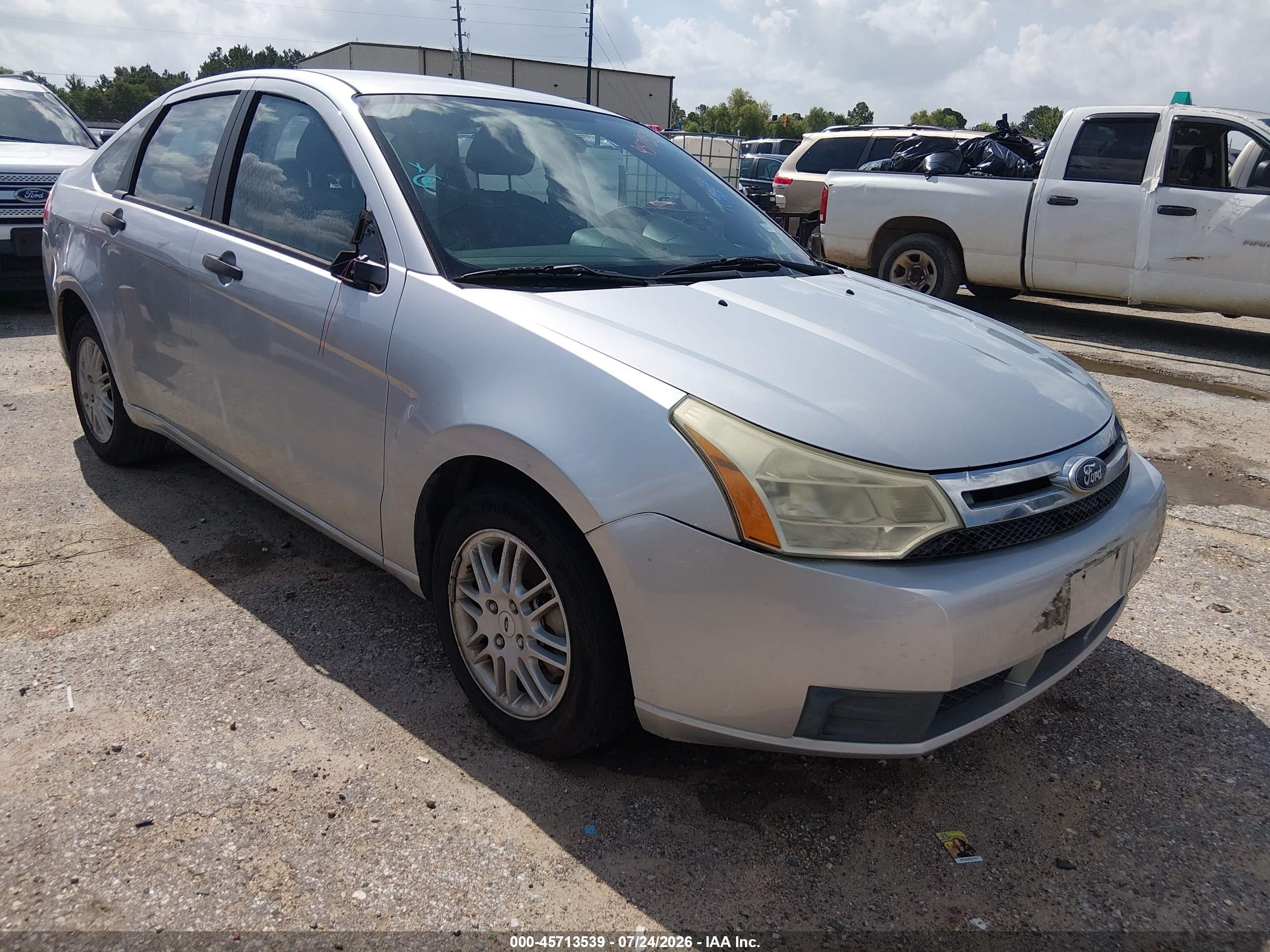 2010 Ford Focus SE, VIN 1FAHP3FN4AW249103 — Normal wear