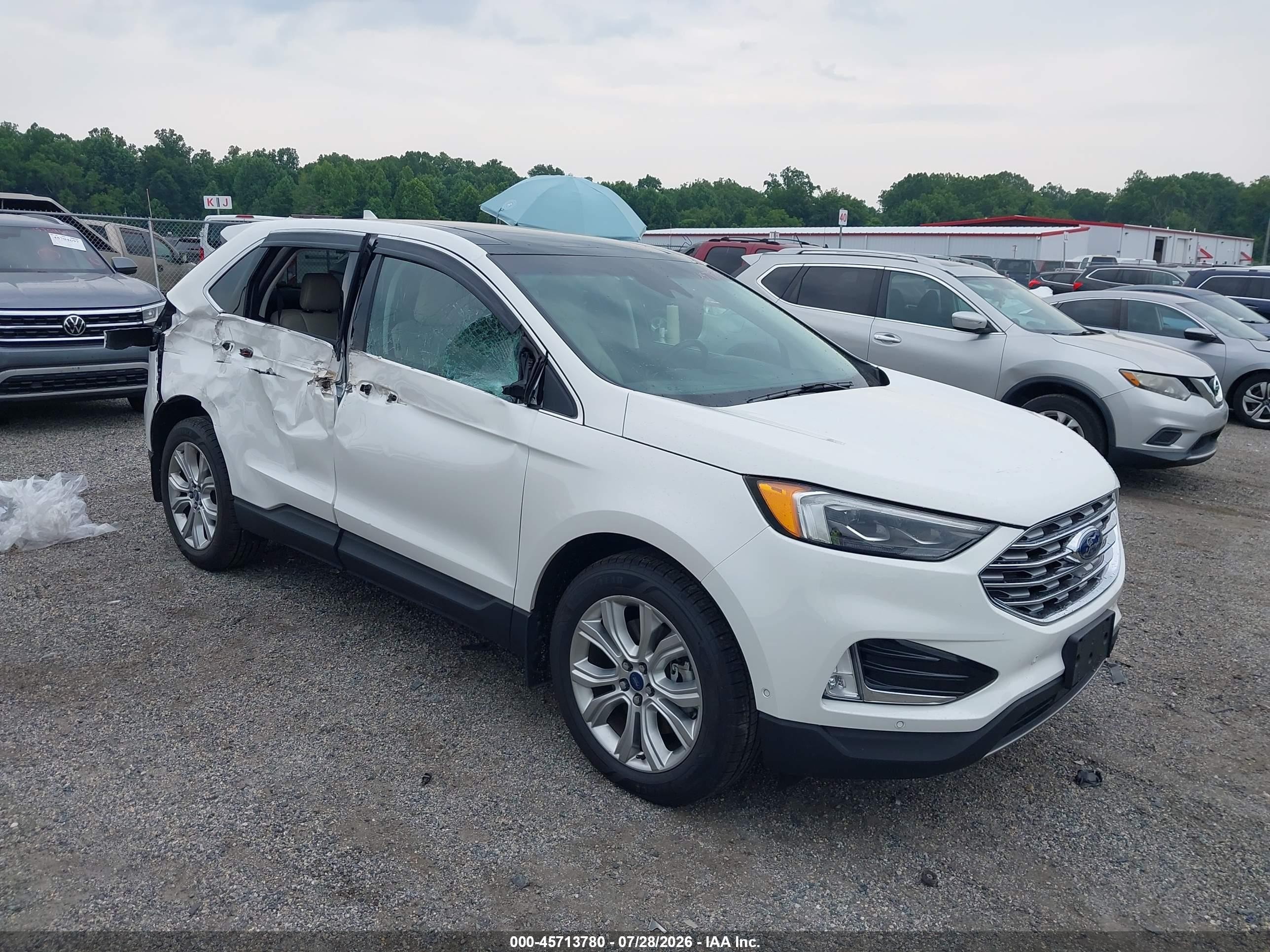 2020 Ford Edge Titanium, VIN 2FMPK4K93LBA67217 — Side