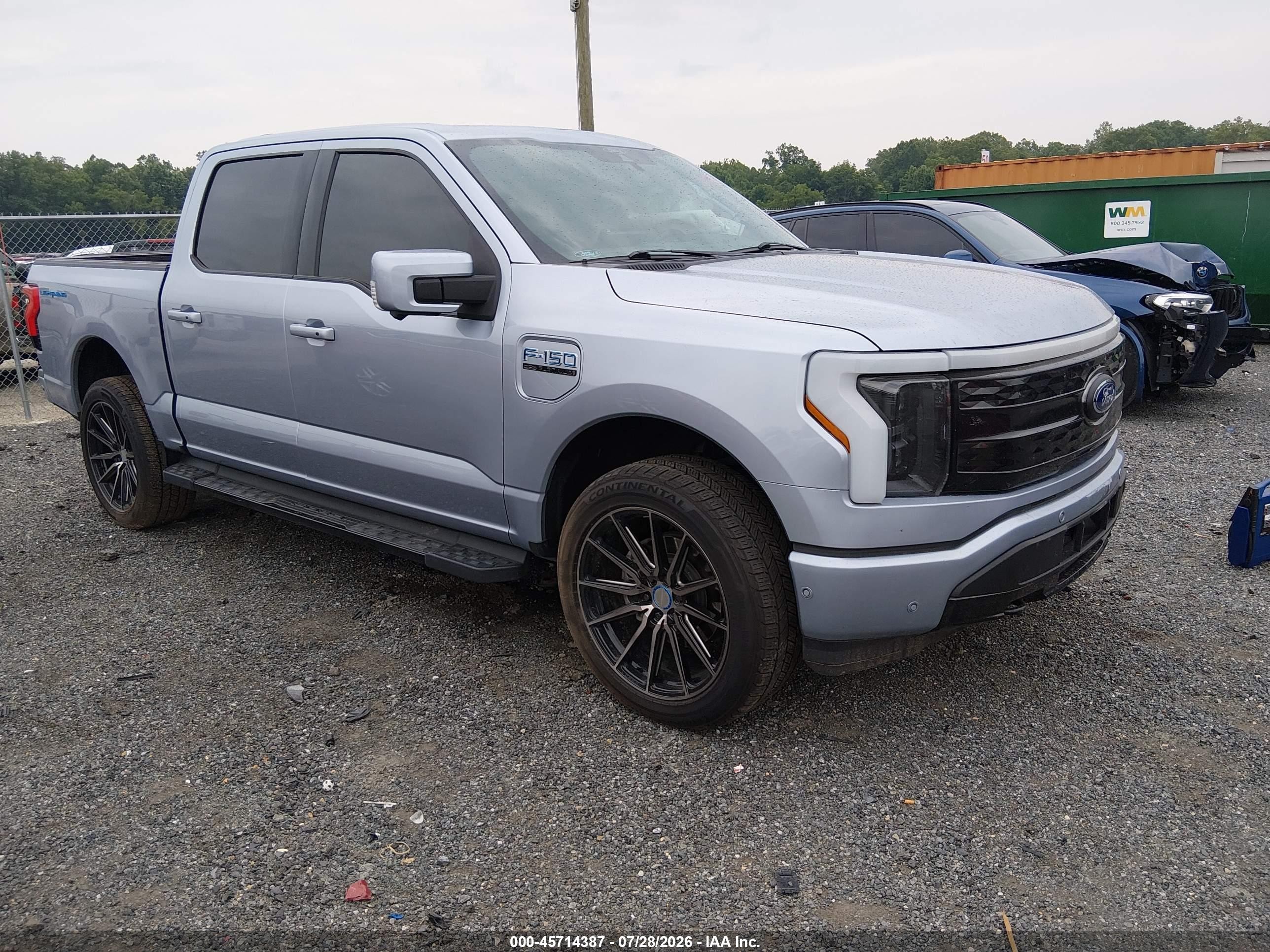 2022 Ford F-150 Lightning Lariat, VIN 1FT6W1EV9NWG02158 — Side