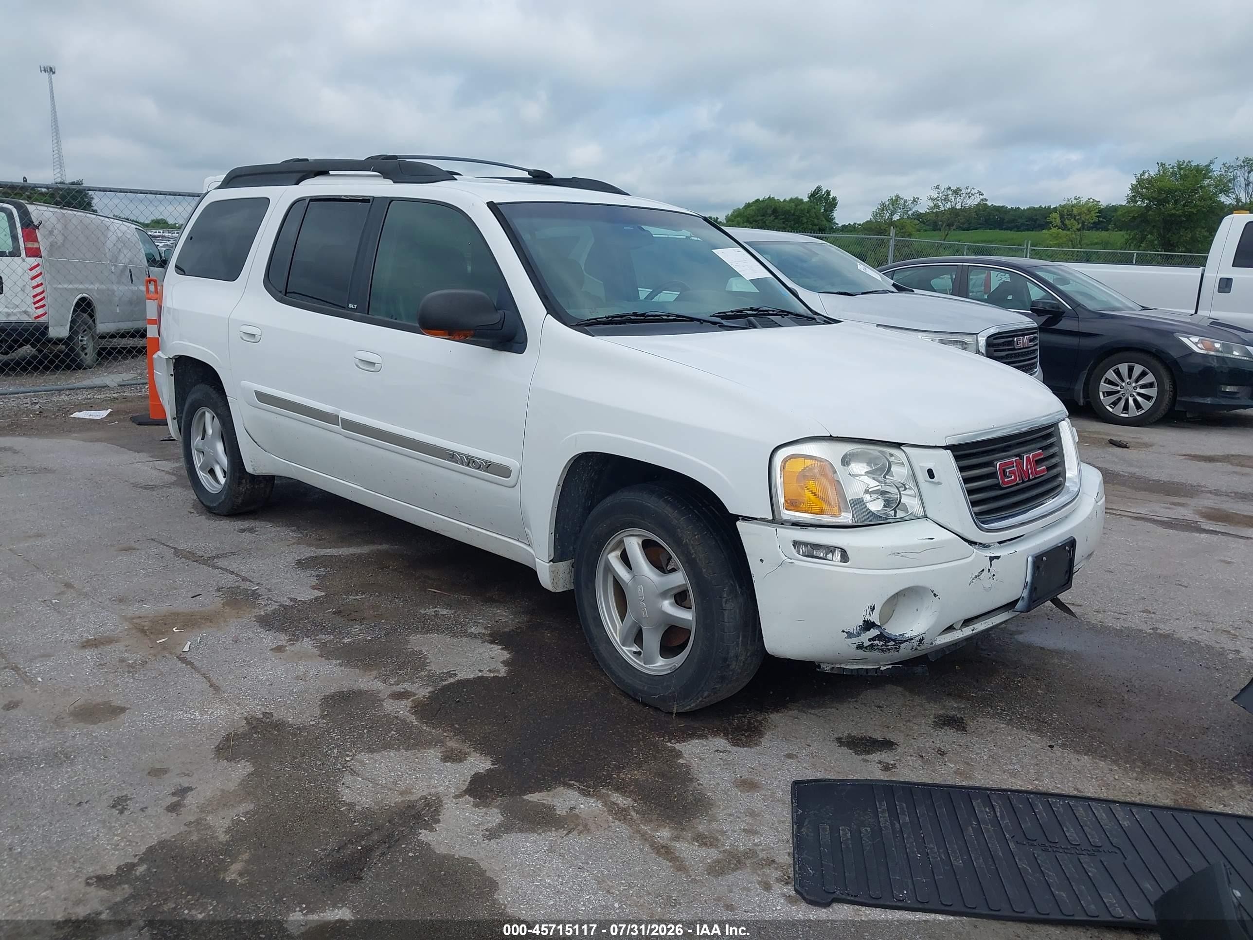 2002 GMC Envoy SLE, VIN 1GKET16S426101171 — По всему кузову