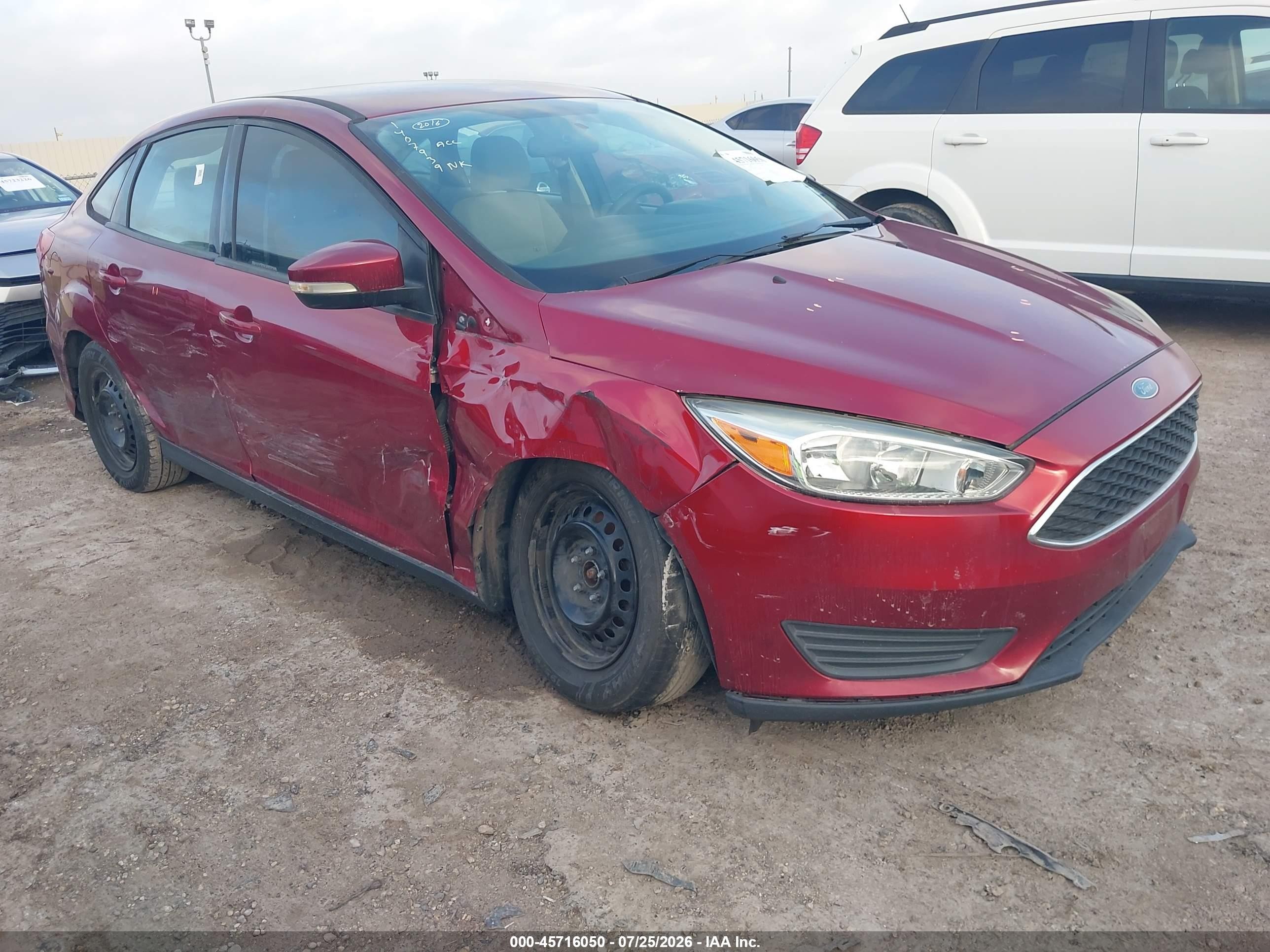 2016 Ford Focus SE, VIN 1FADP3F25GL253160 — Hail