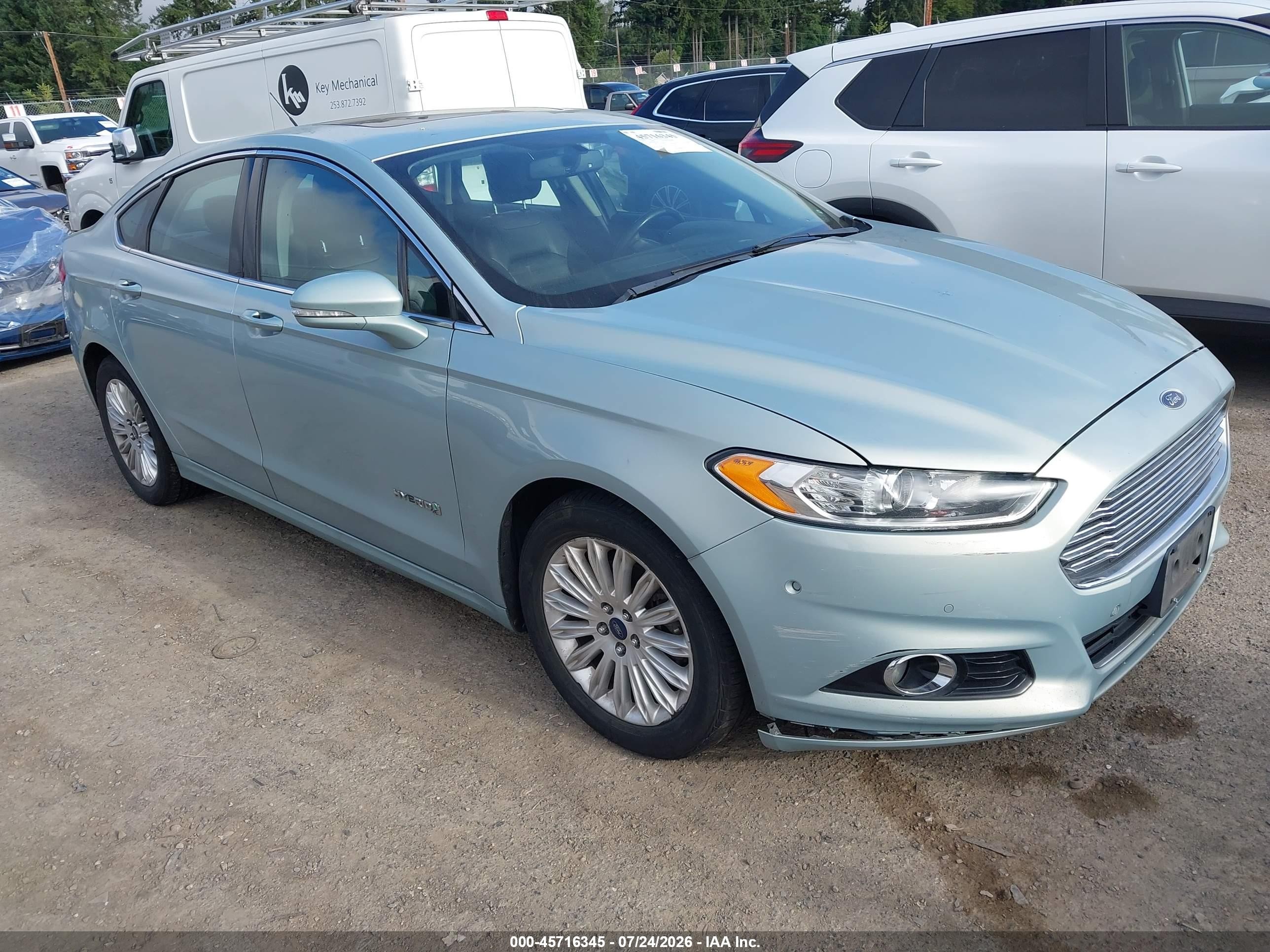 2013 Ford Fusion SE Hybrid, VIN 3FA6P0LU6DR345663 — Normal wear
