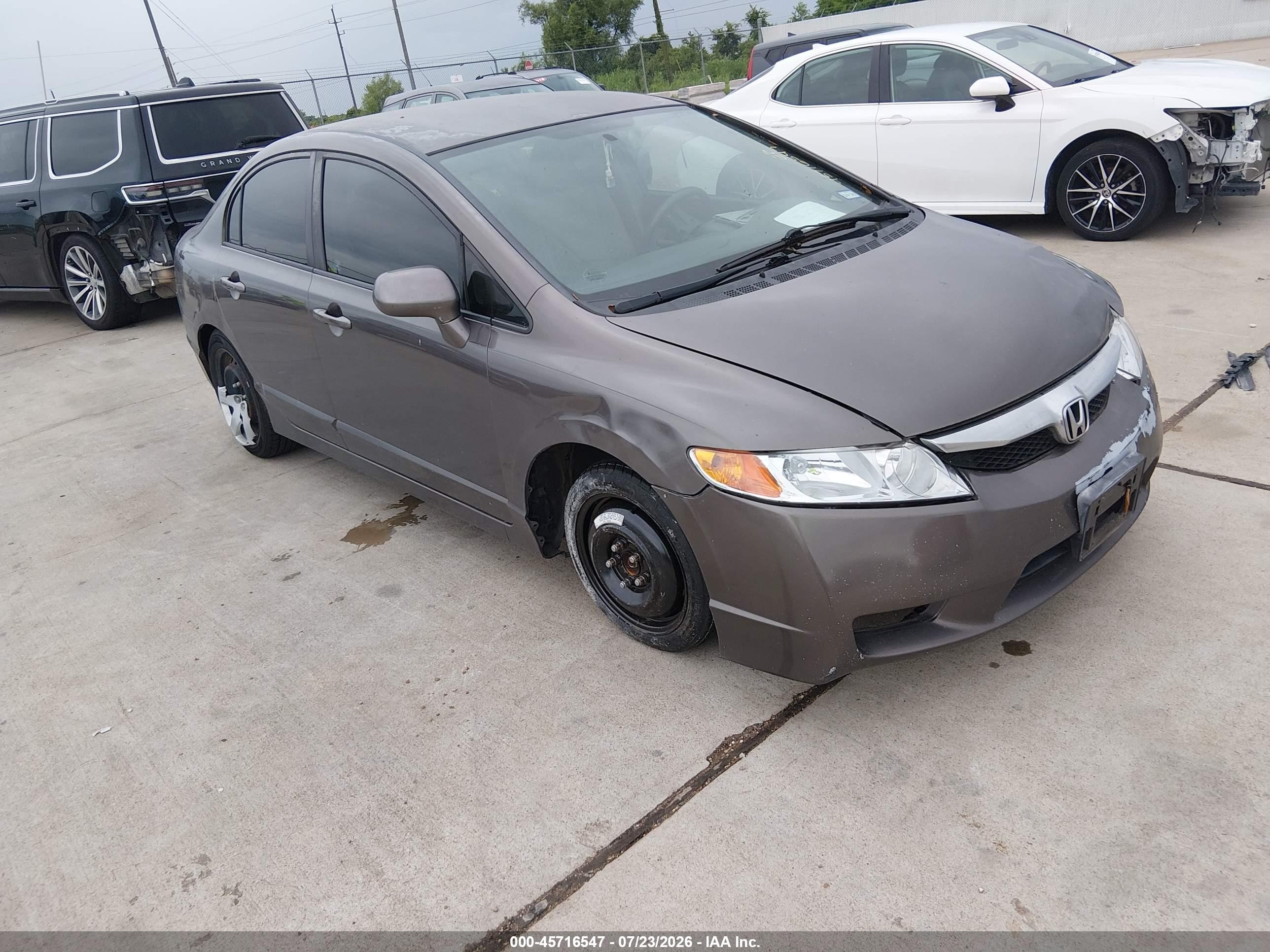 2010 Honda Civic LX, VIN 2HGFA1F50AH567629 — Side