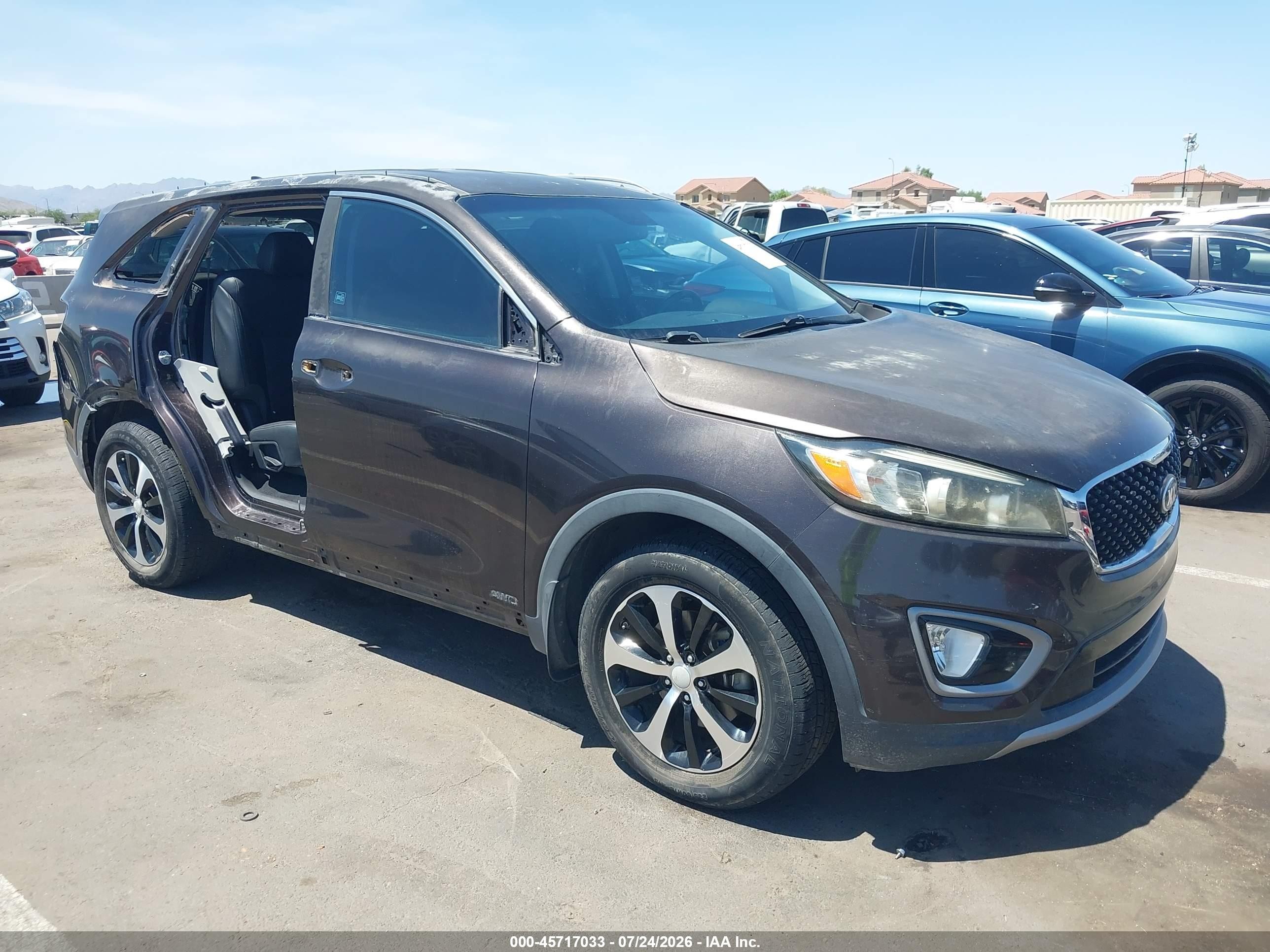 2016 Kia Sorento EX, VIN 5XYPHDA1XGG018046 — Side