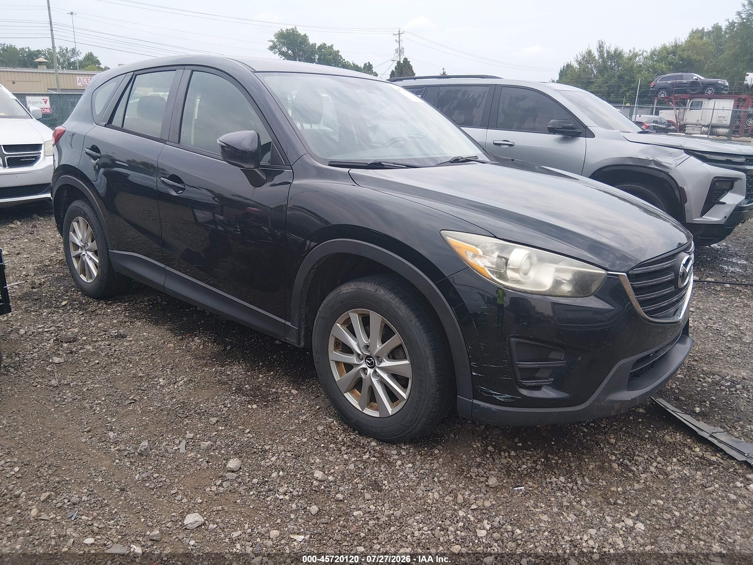 2016 Mazda CX-5 Sport, VIN JM3KE2BY0G0666267 — Side