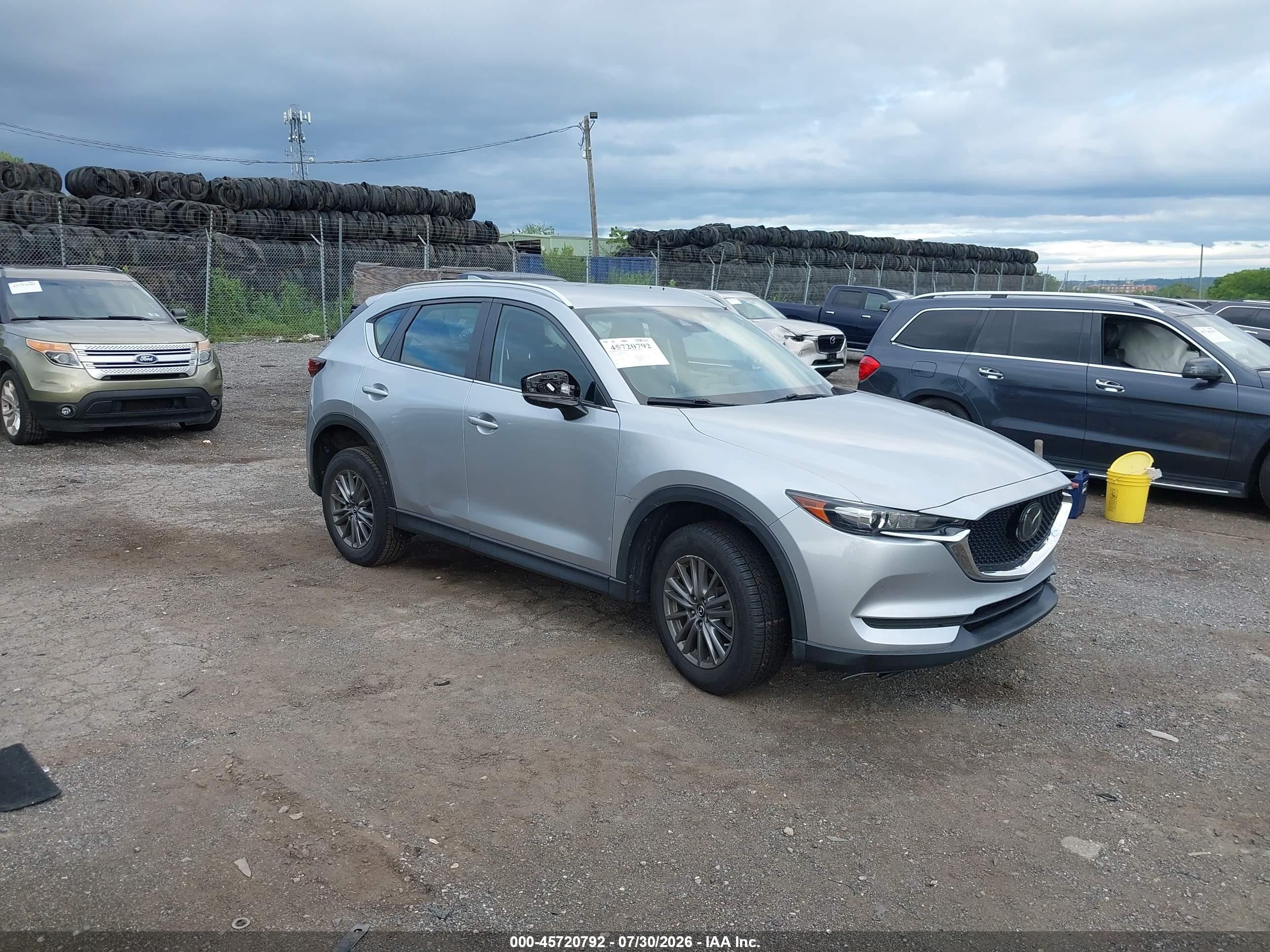 2018 Mazda CX-5 Sport, VIN JM3KFABM0J0416474 — Side