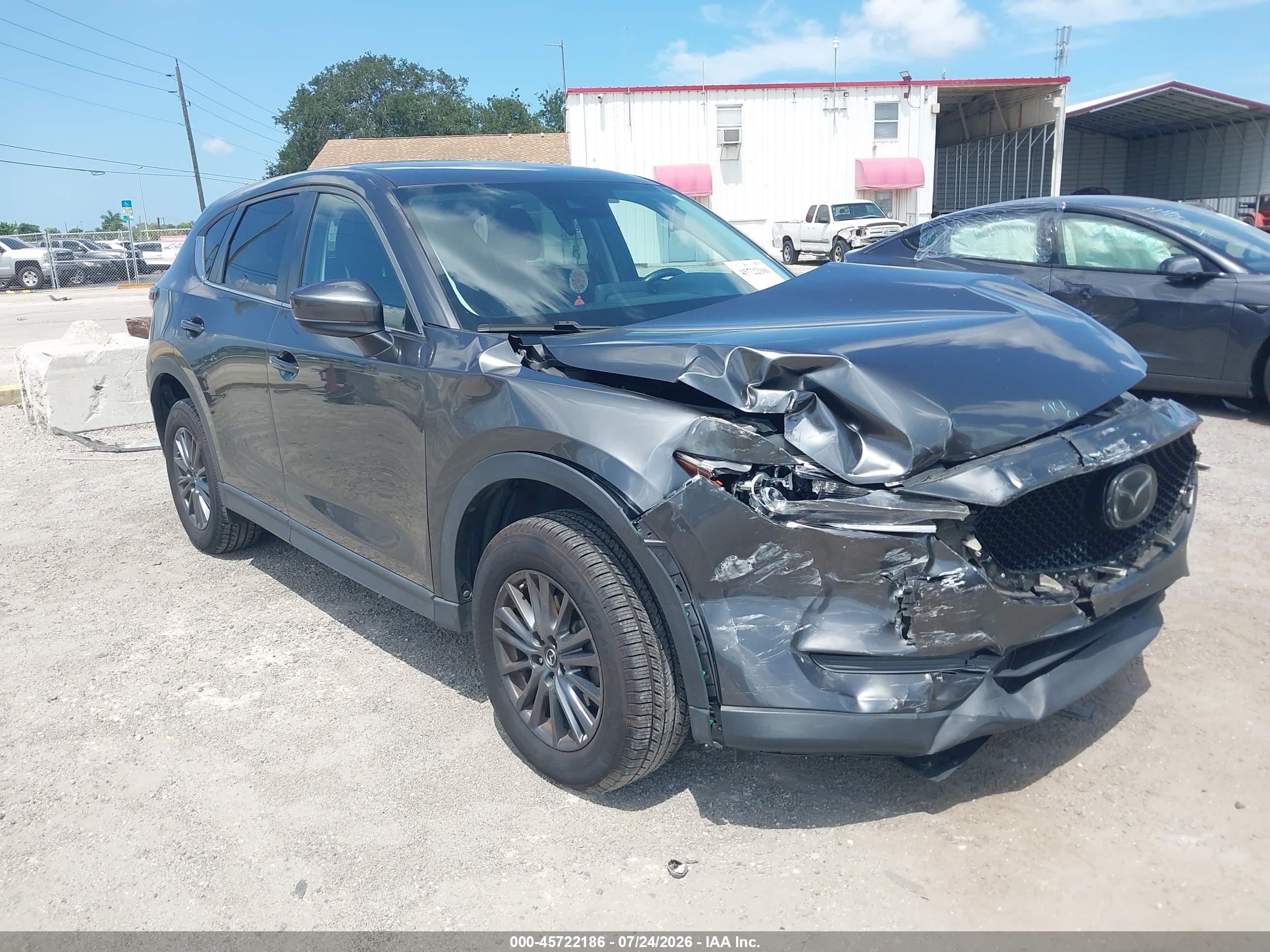 2019 Mazda CX-5 Touring, VIN JM3KFACM0K0654048 — Перед