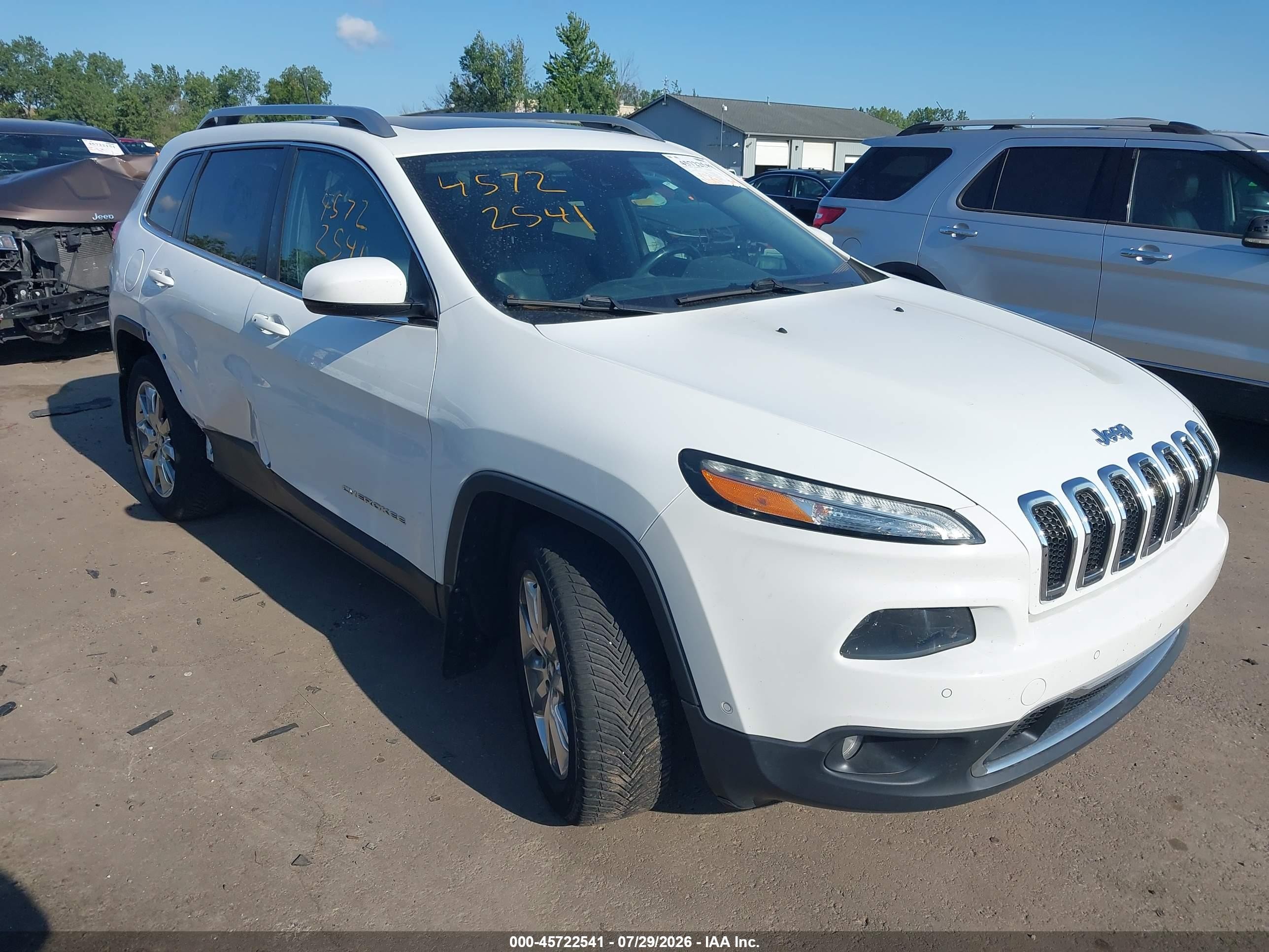 2014 Jeep Cherokee Limited, VIN 1C4PJMDS9EW152295 — Side