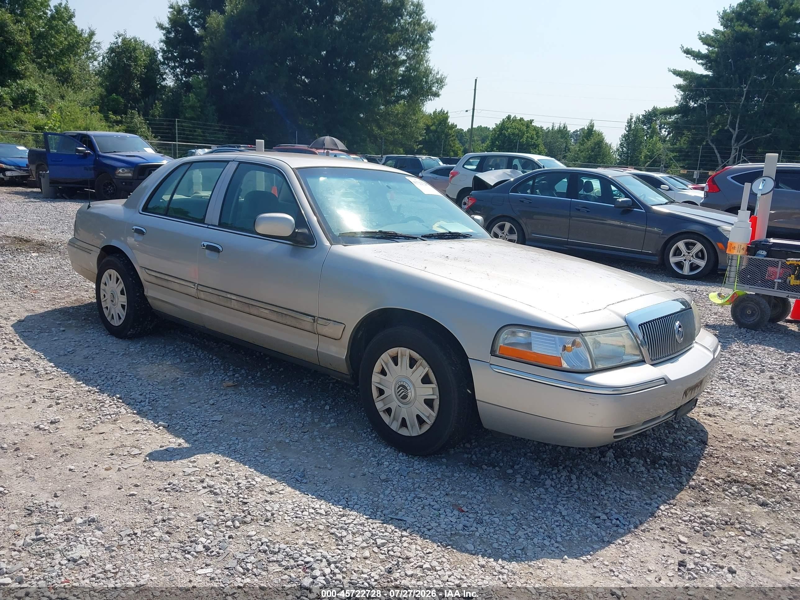 2005 Mercury Grand Marquis GS, VIN 2MEFM74W65X673887 — Side