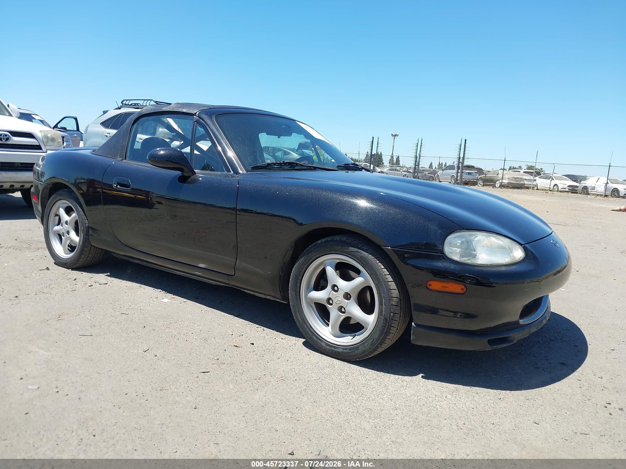 1999 Mazda MX-5 Miata, VIN JM1NB3531X0113423 — Normal wear