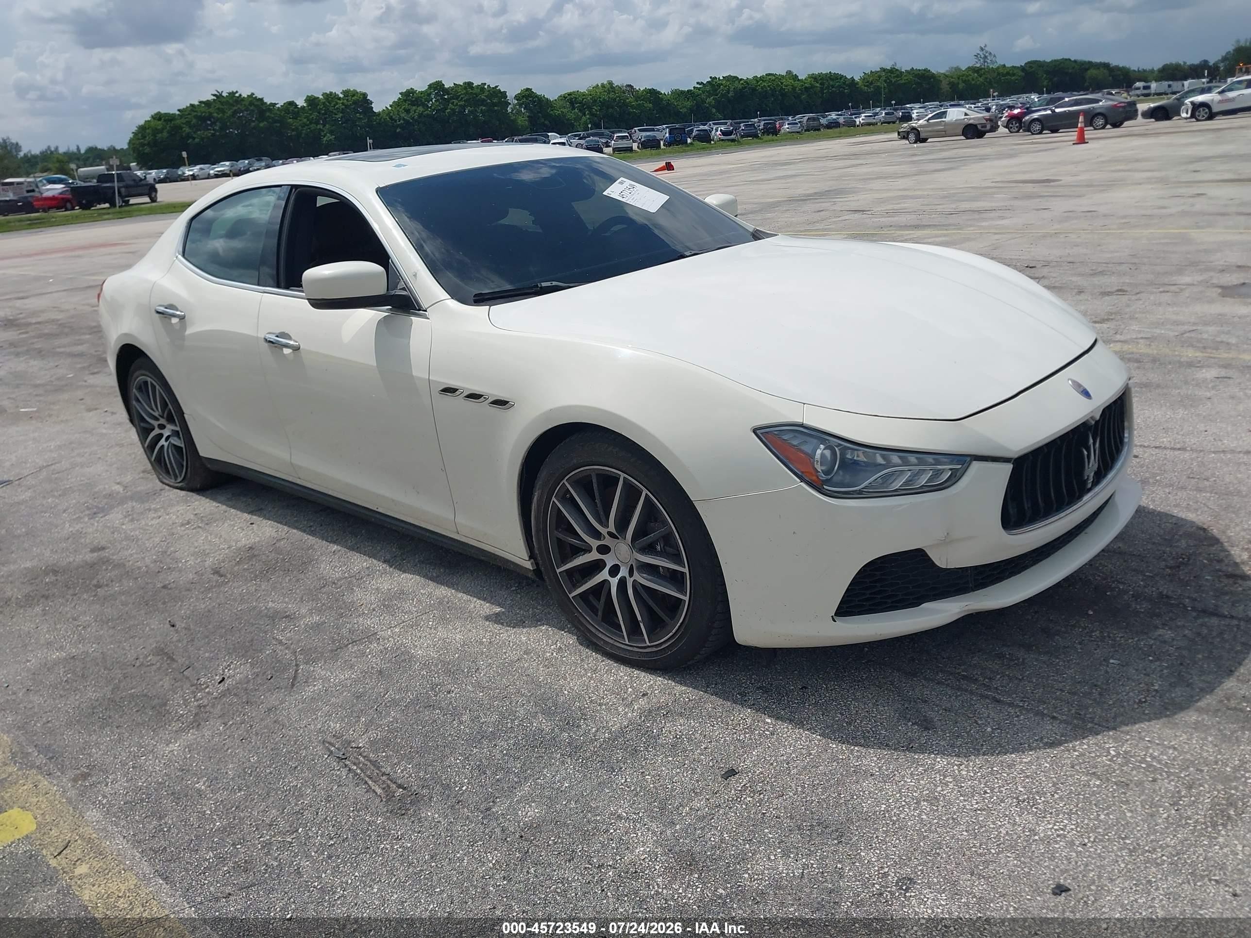 2014 Maserati Ghibli, VIN ZAM57XSA4E1128142 — Normal wear