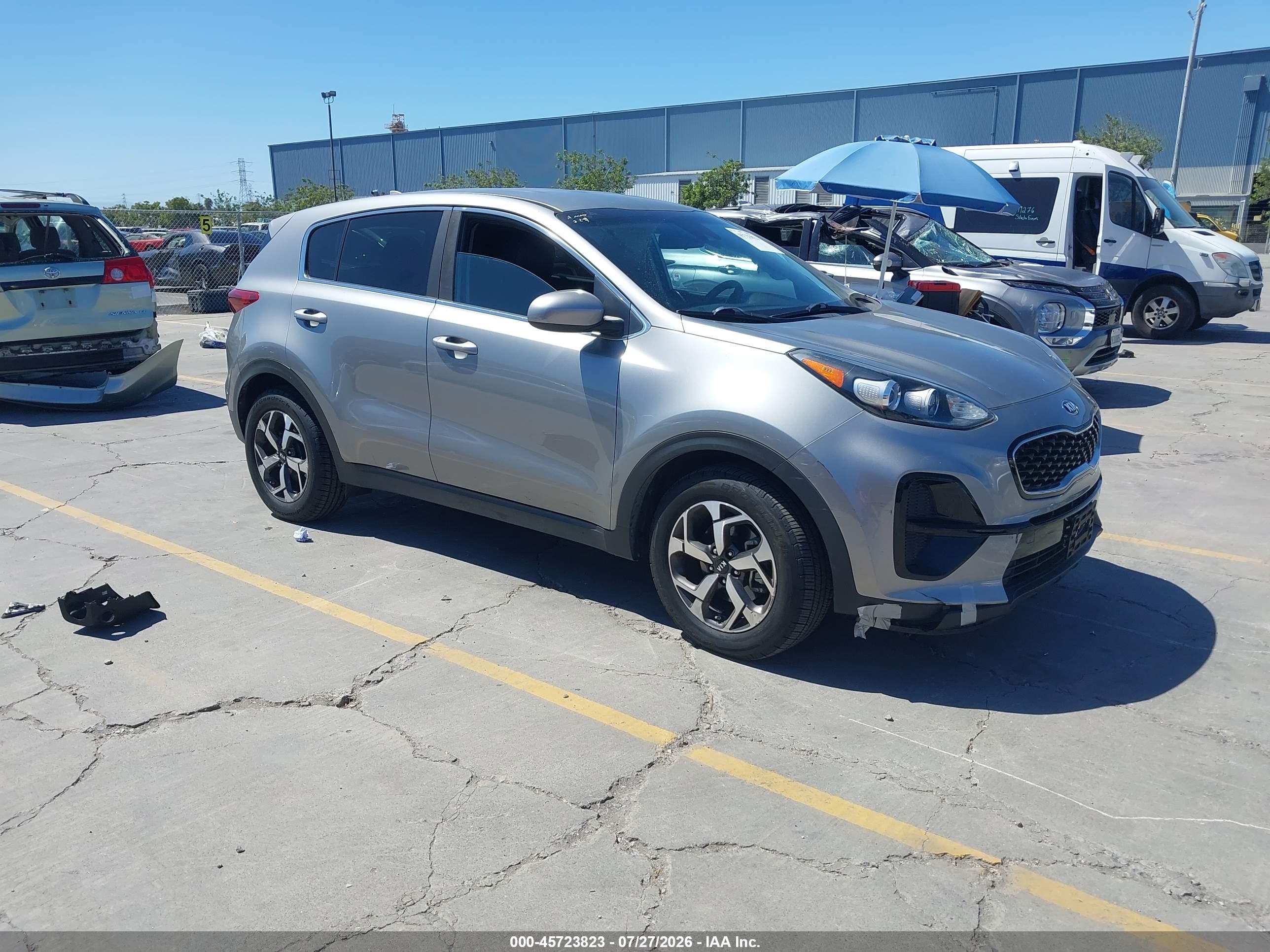 2020 Kia Sportage LX, VIN KNDPM3AC2L7701213 — Side