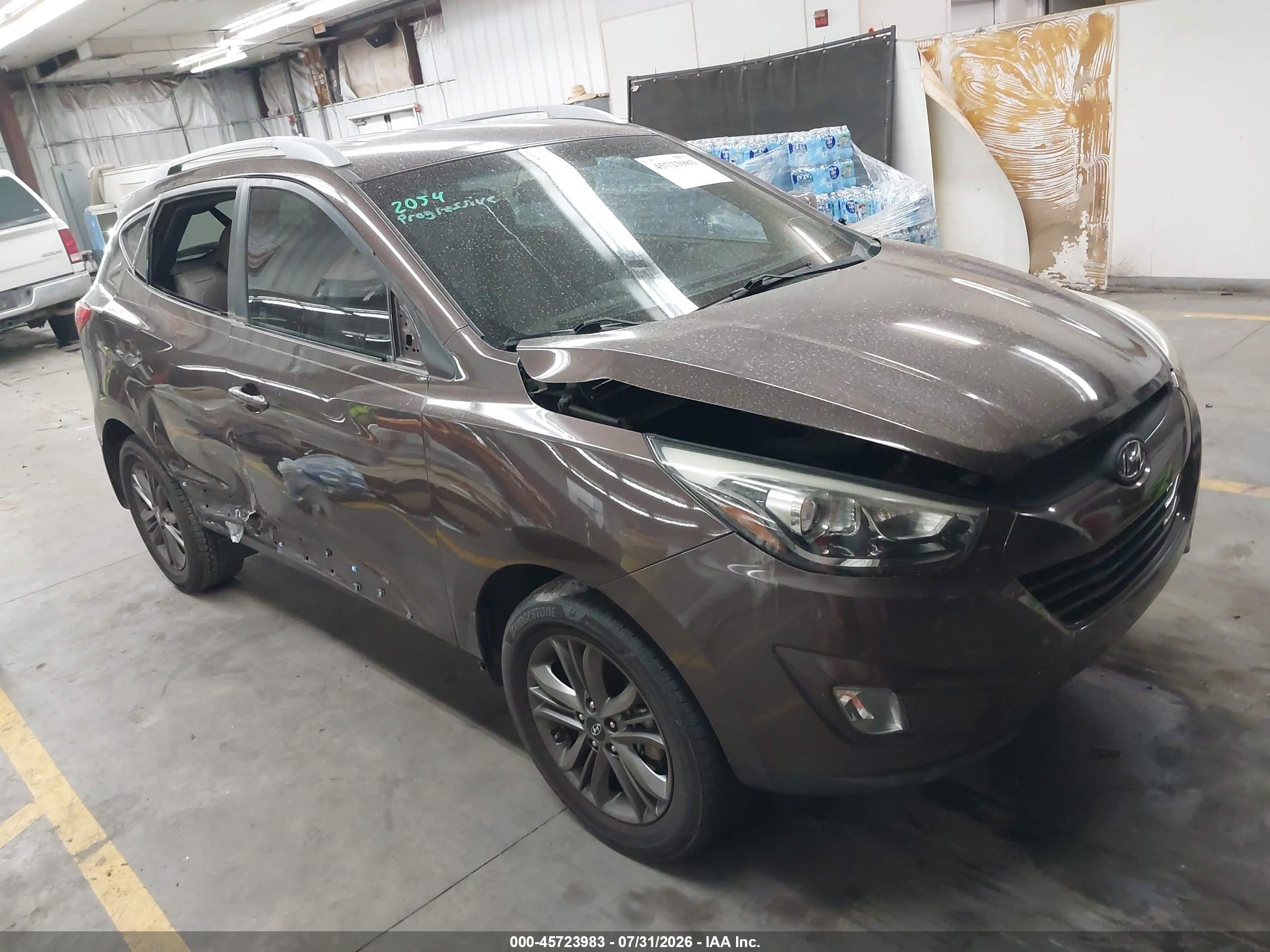 2014 Hyundai Tucson SE, VIN KM8JU3AG5EU839840 — Бок