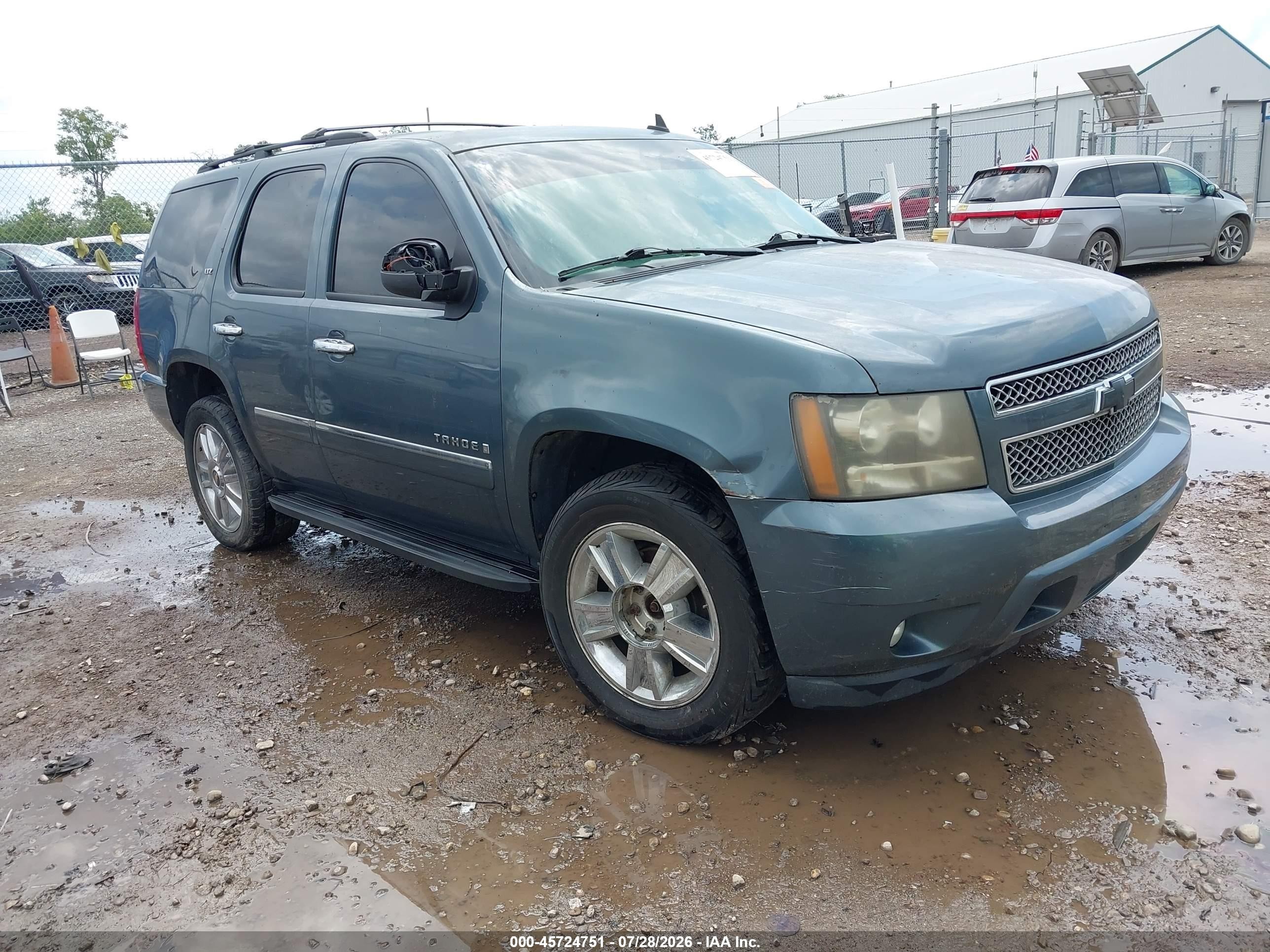 2009 Chevrolet Tahoe LTZ, VIN 1GNFK33029J113903 — Water / flood