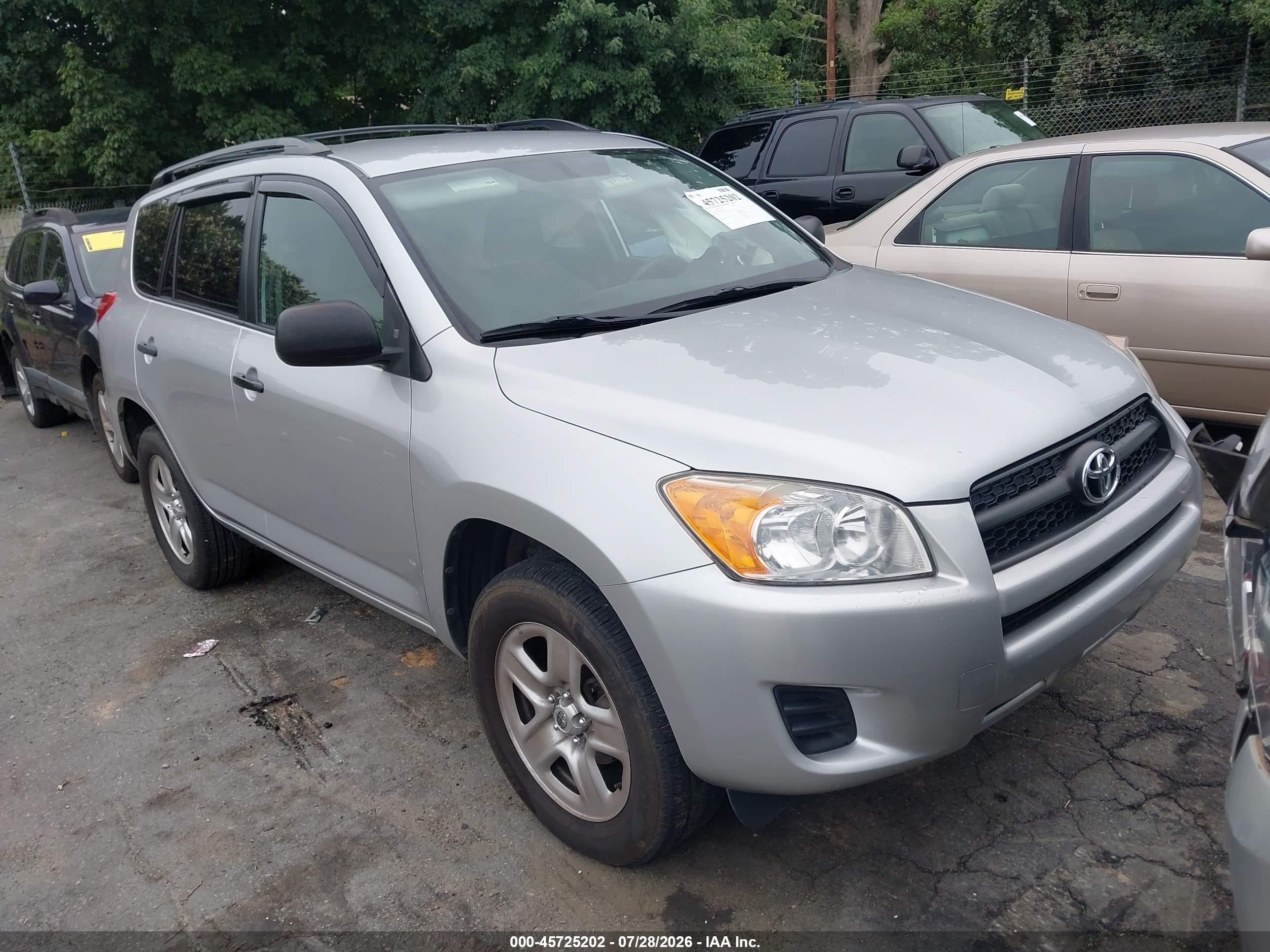 2011 Toyota RAV4, VIN 2T3ZF4DV9BW097314 — Side
