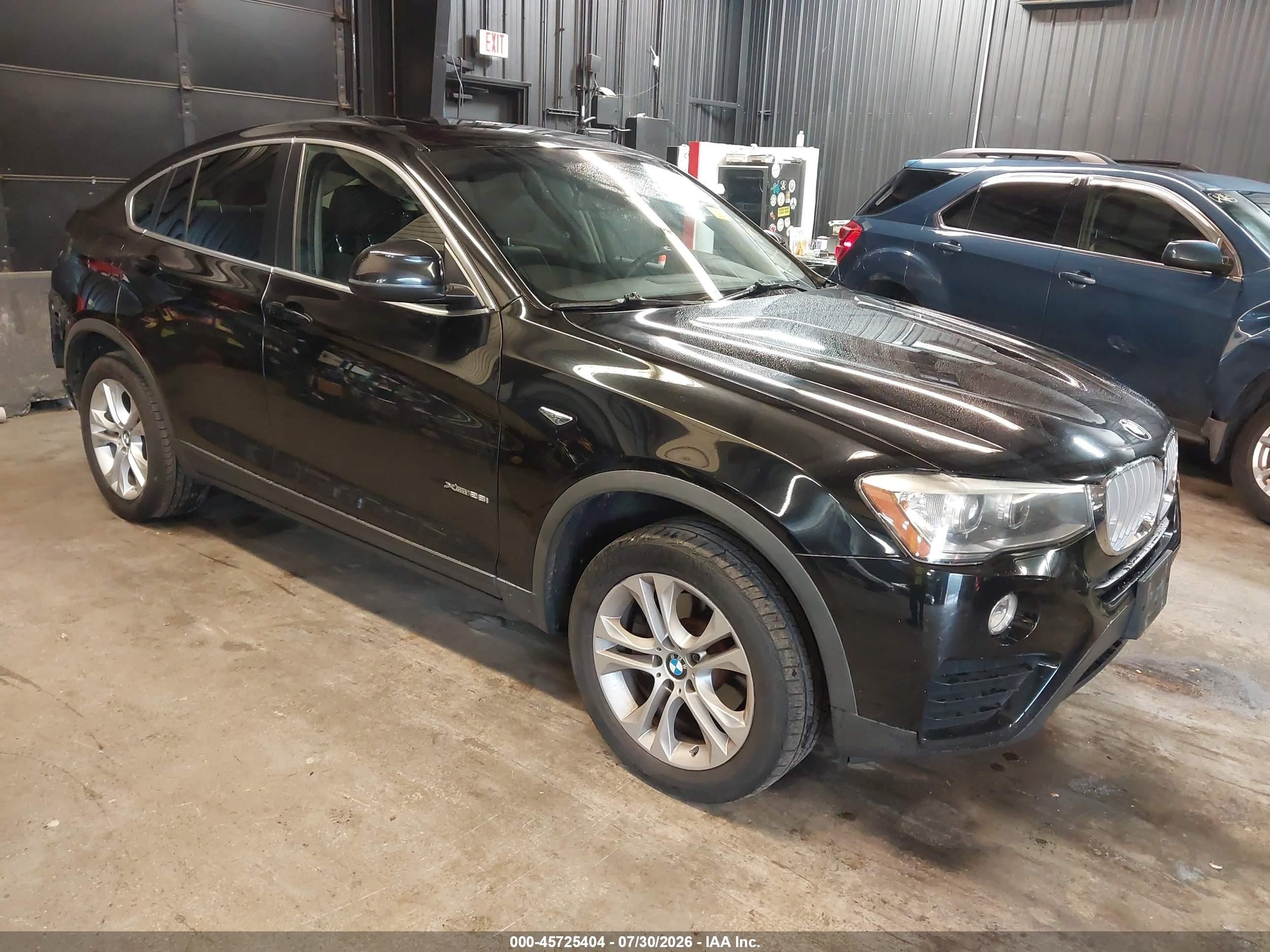 2015 BMW X4 xDrive28i, VIN 5UXXW3C5XF0F89168 — Rear end