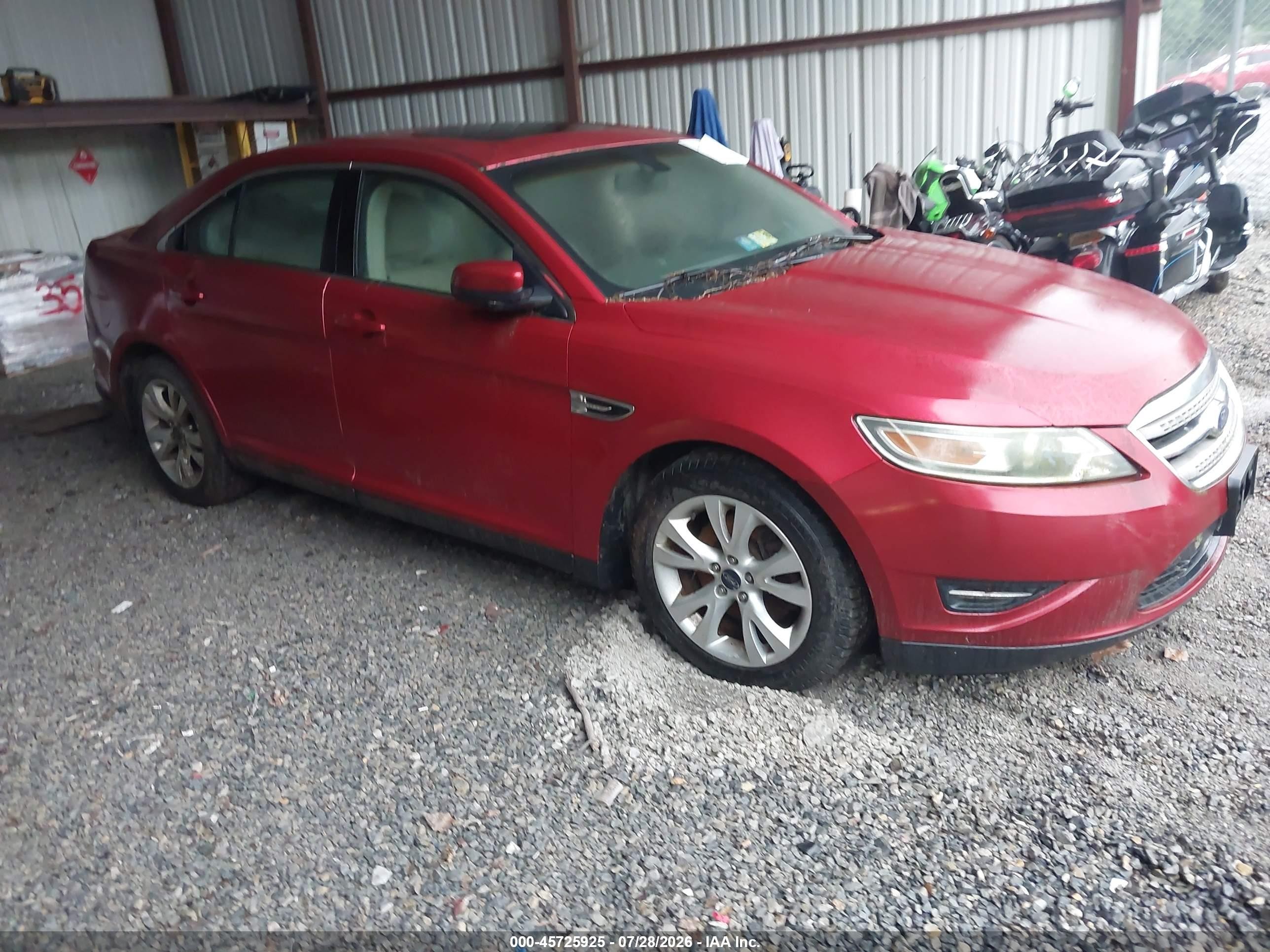 2011 Ford Taurus SEL, VIN 1FAHP2HW1BG123244 — Side