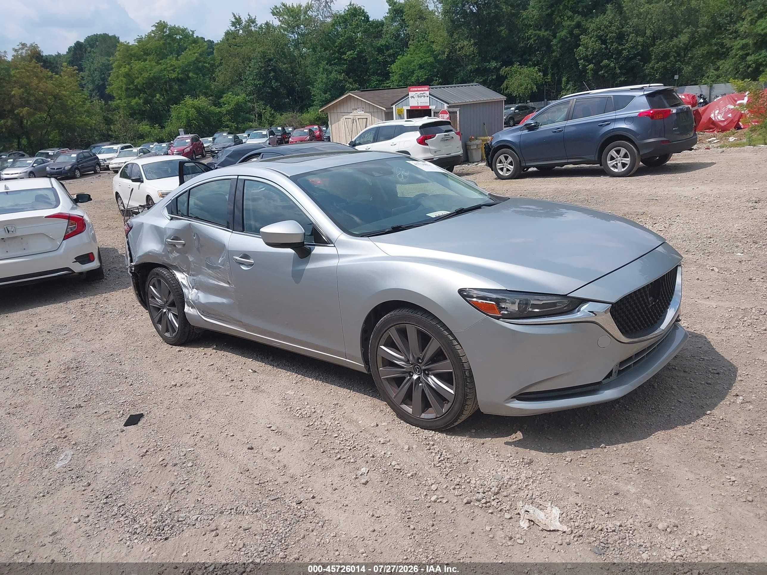 2018 Mazda 6 Touring, VIN JM1GL1VM6J1313735 — Бок