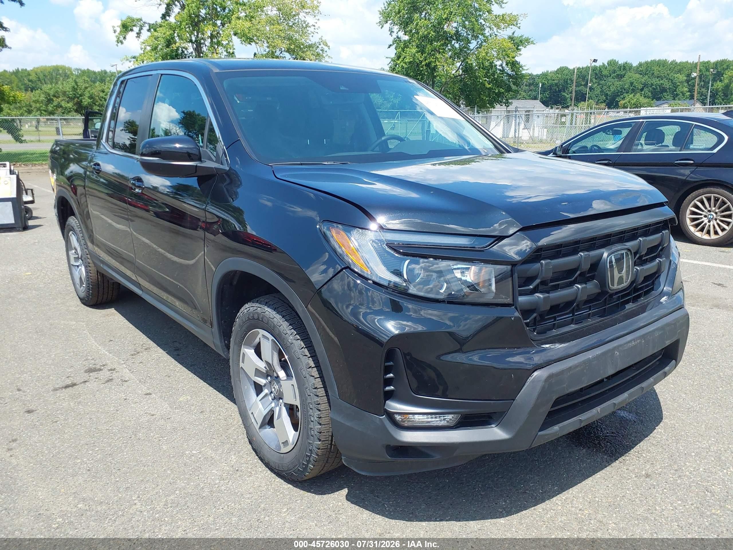 2026 Honda Ridgeline RTL, VIN 5FPYK3F57TB018784 — Front end