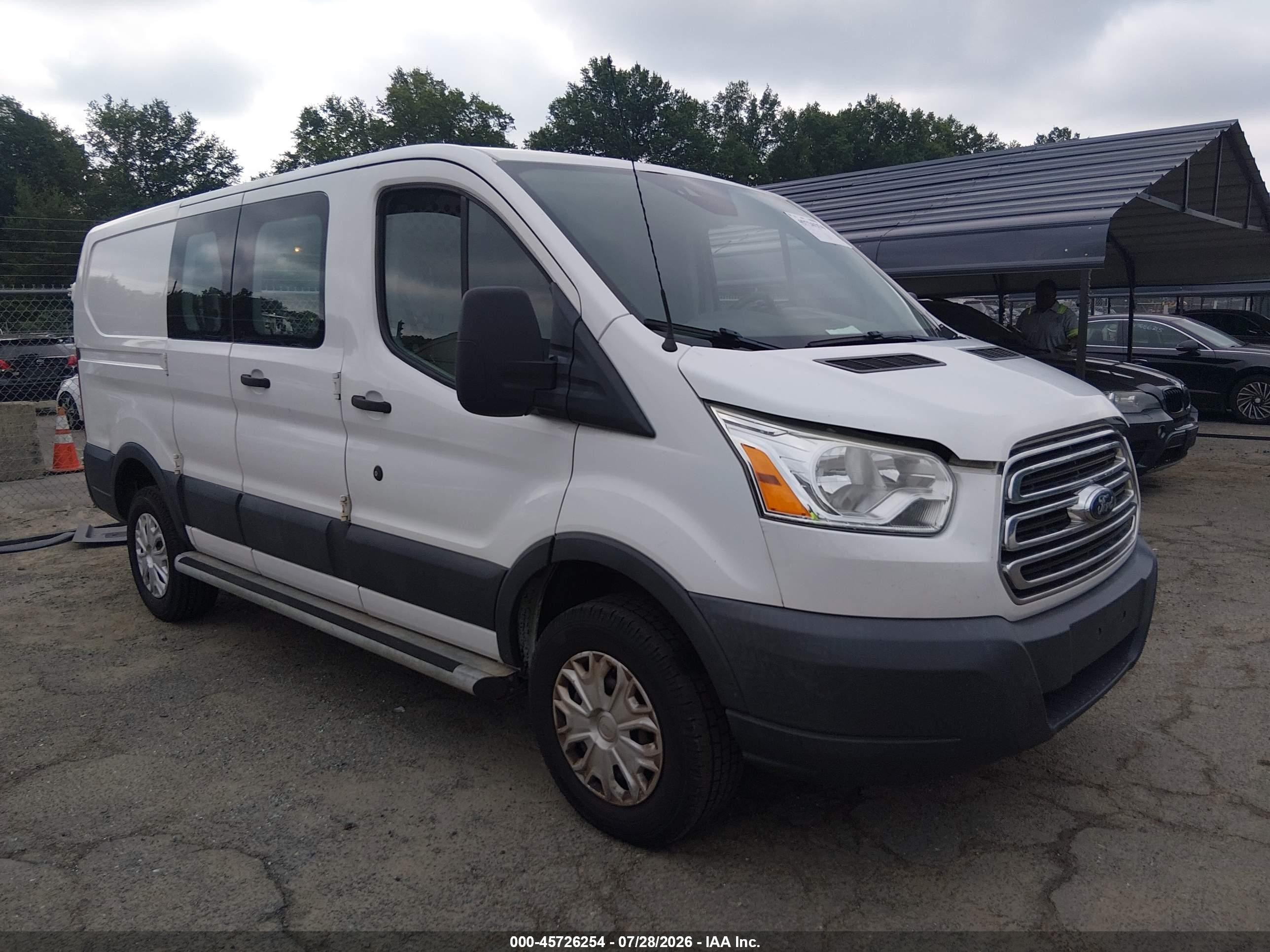 2016 Ford Transit Cargo, VIN 1FTYR1ZM9GKA87299 — Rear end