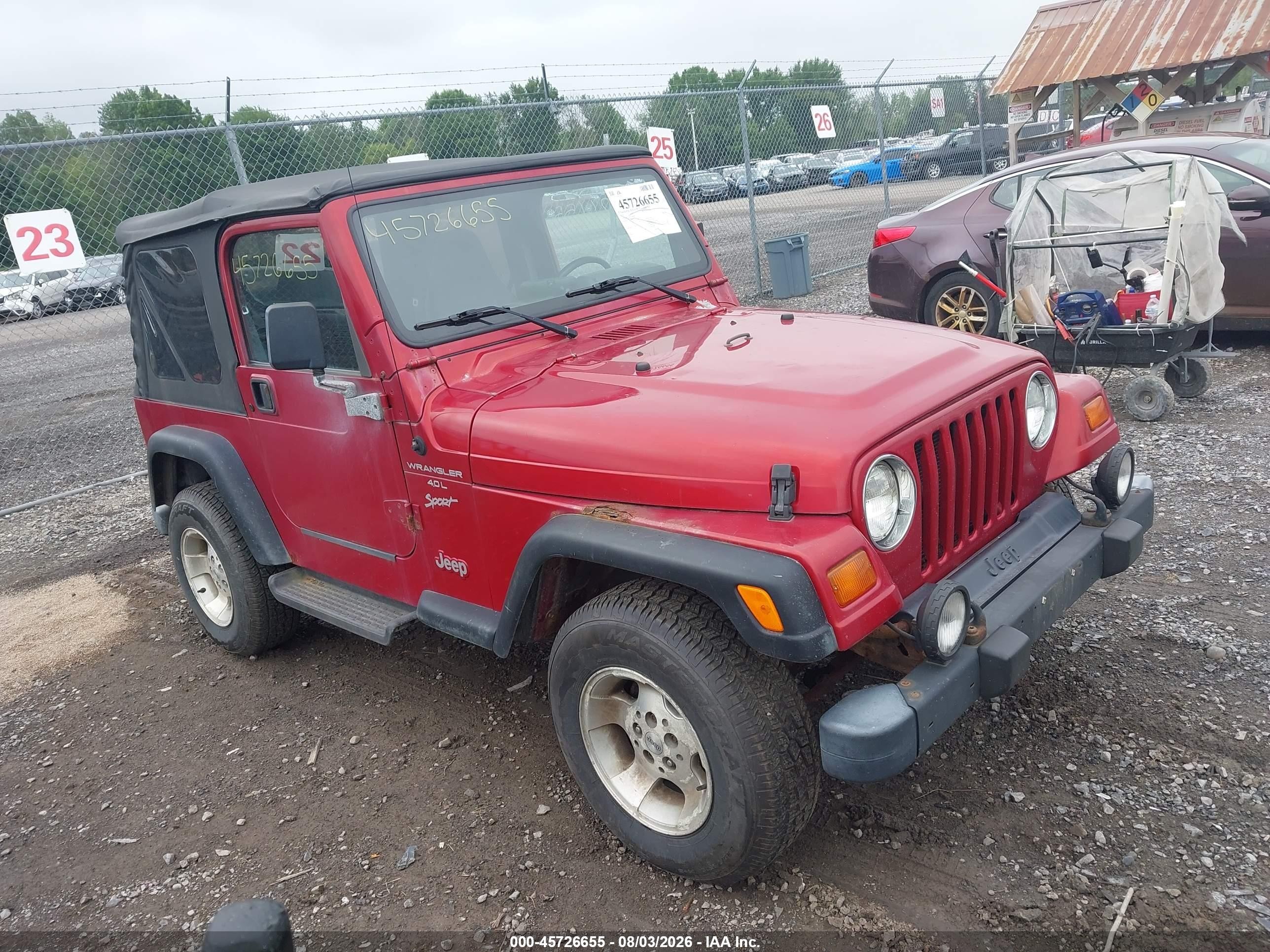 1999 Jeep Wrangler Sport, VIN 1J4FY19S7XP486699 — Normal wear