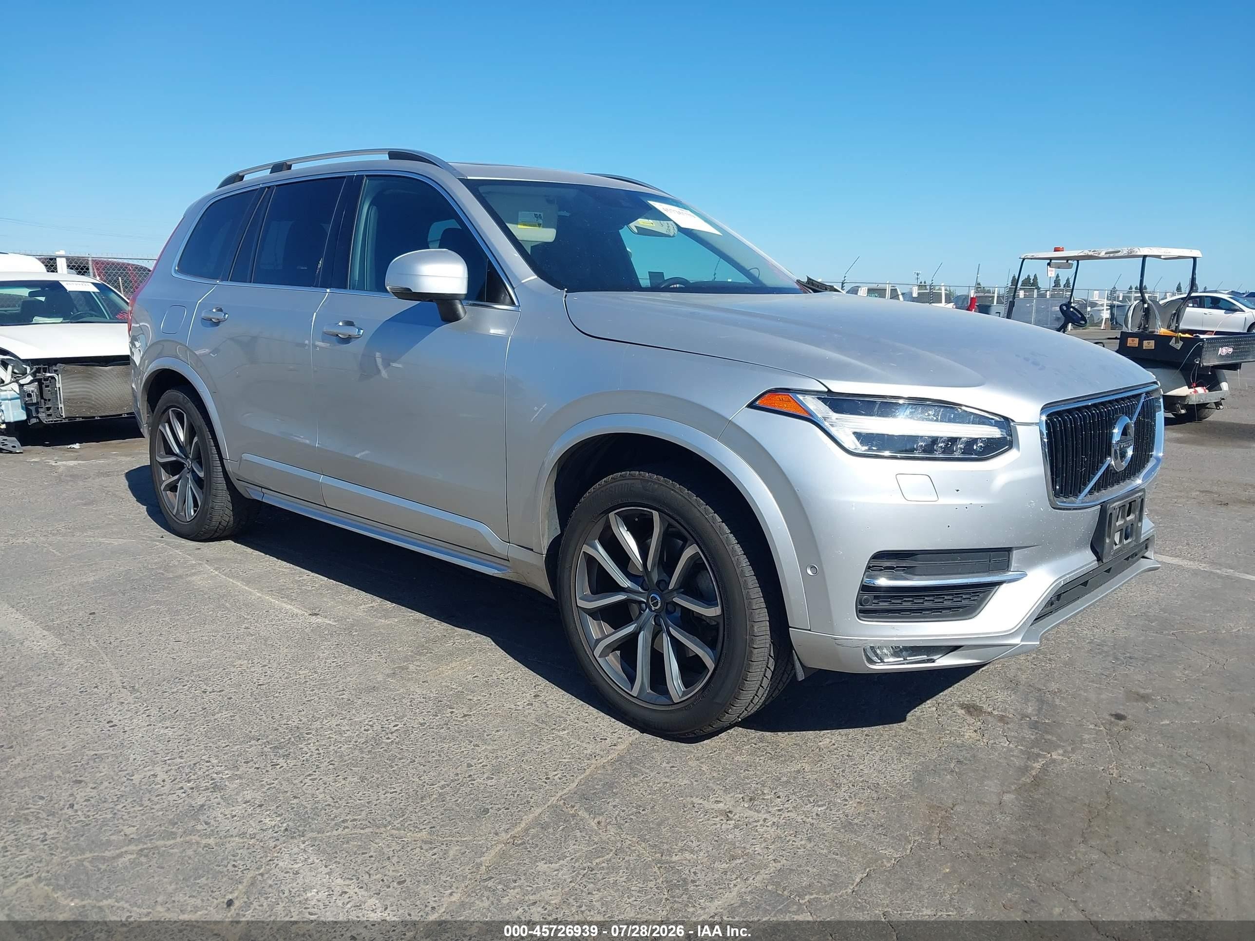 2017 Volvo XC90 Momentum, VIN YV4A22PK4H1181950 — Side