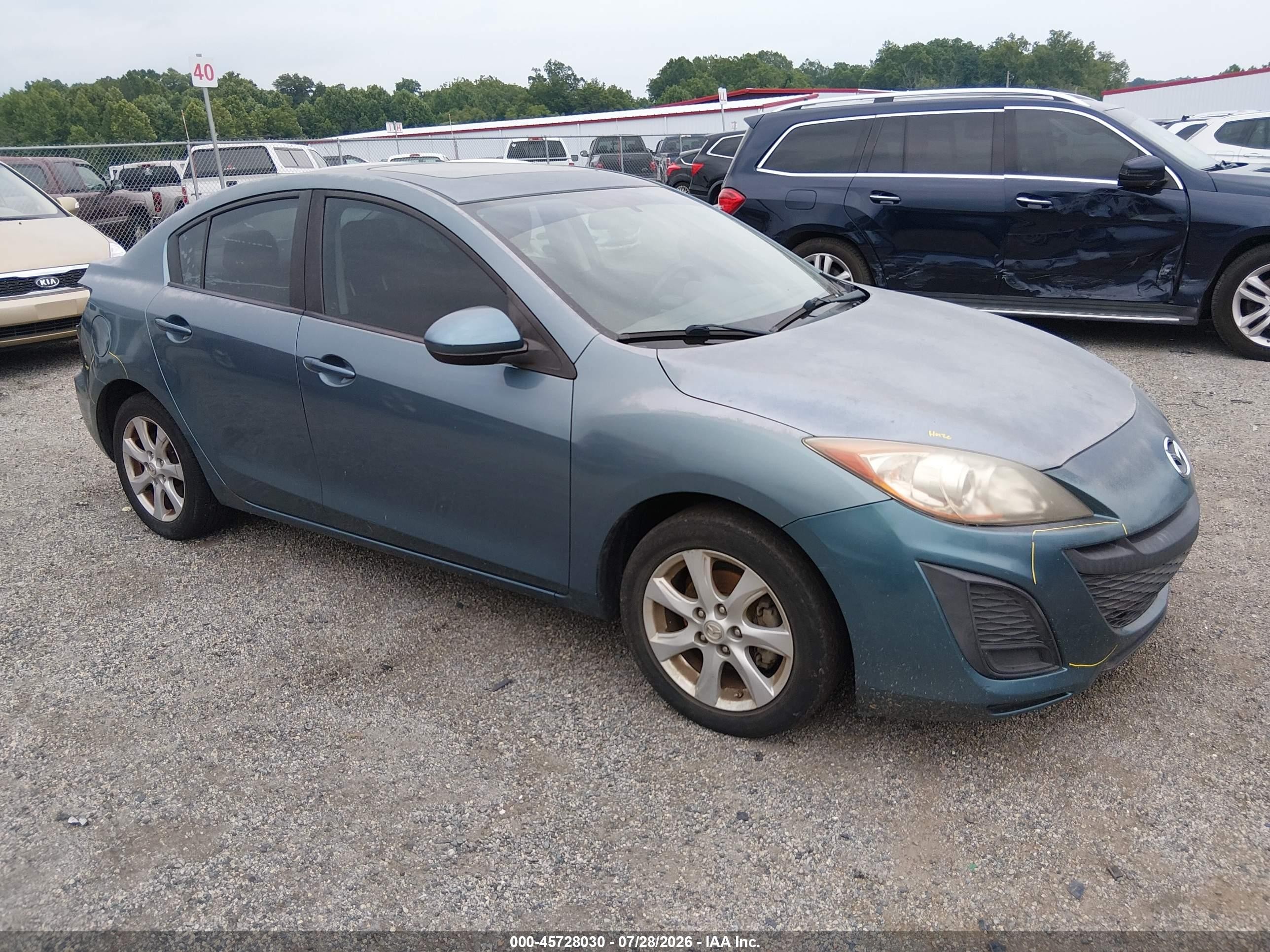 2011 Mazda 3 i Touring, VIN JM1BL1VF0B1498667 — Rear end