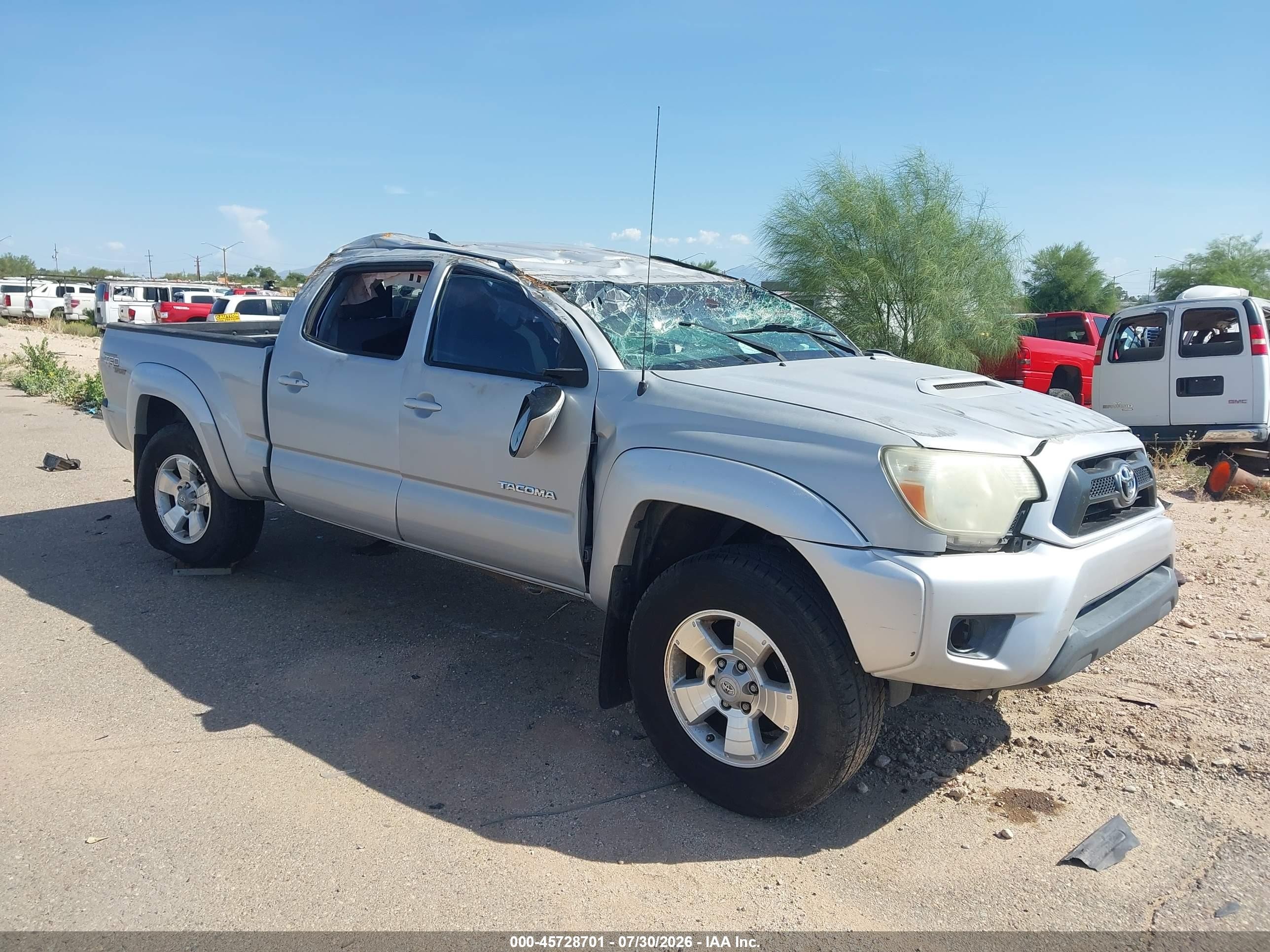 2012 Toyota Tacoma PreRunner, VIN 3TMKU4HN2CM033166 — Rollover