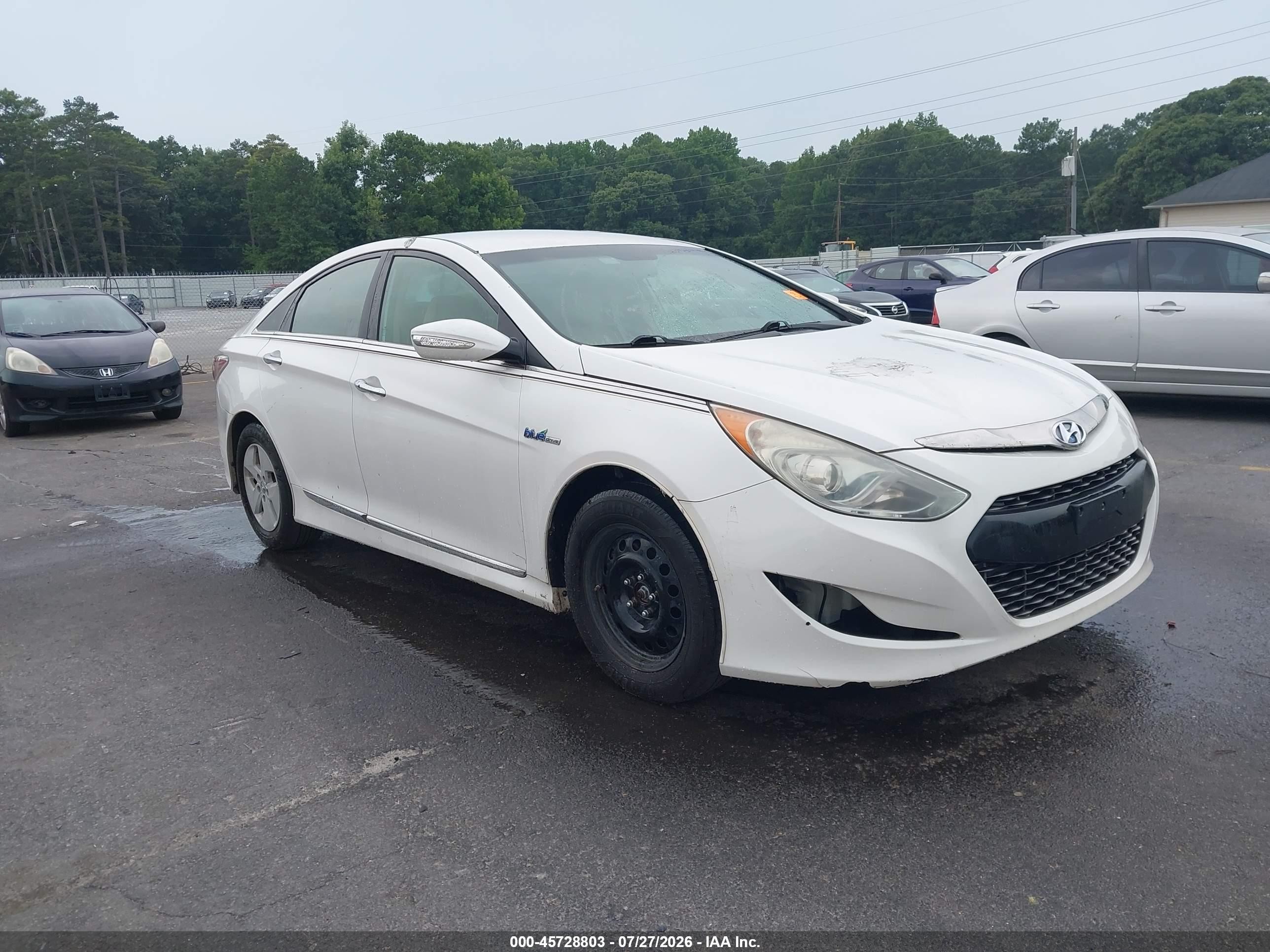 2012 Hyundai Sonata Hybrid, VIN KMHEC4A41CA026042 — Normal wear