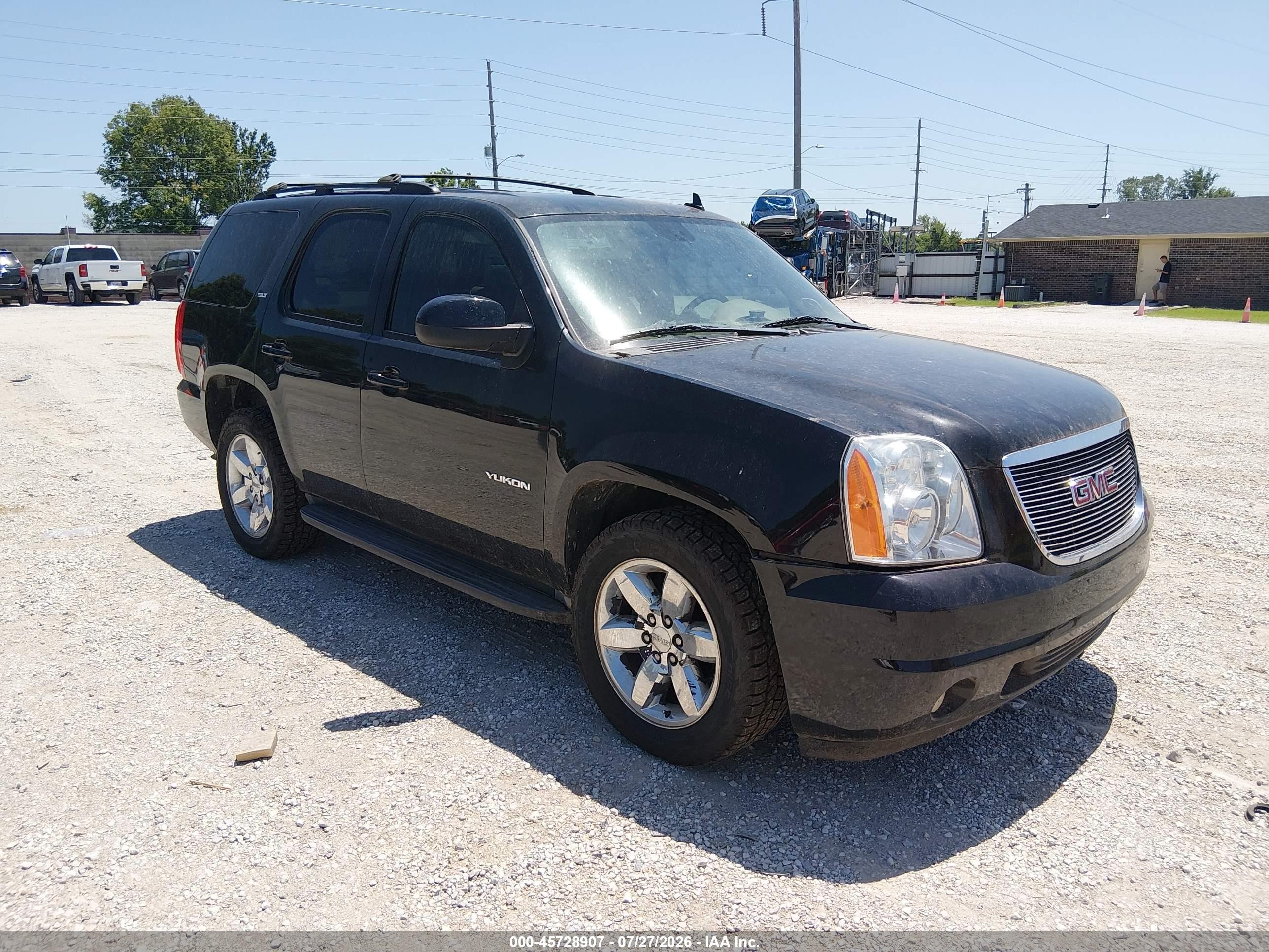 2011 GMC Yukon SLT, VIN 1GKS1CE00BR101574 — Normal wear