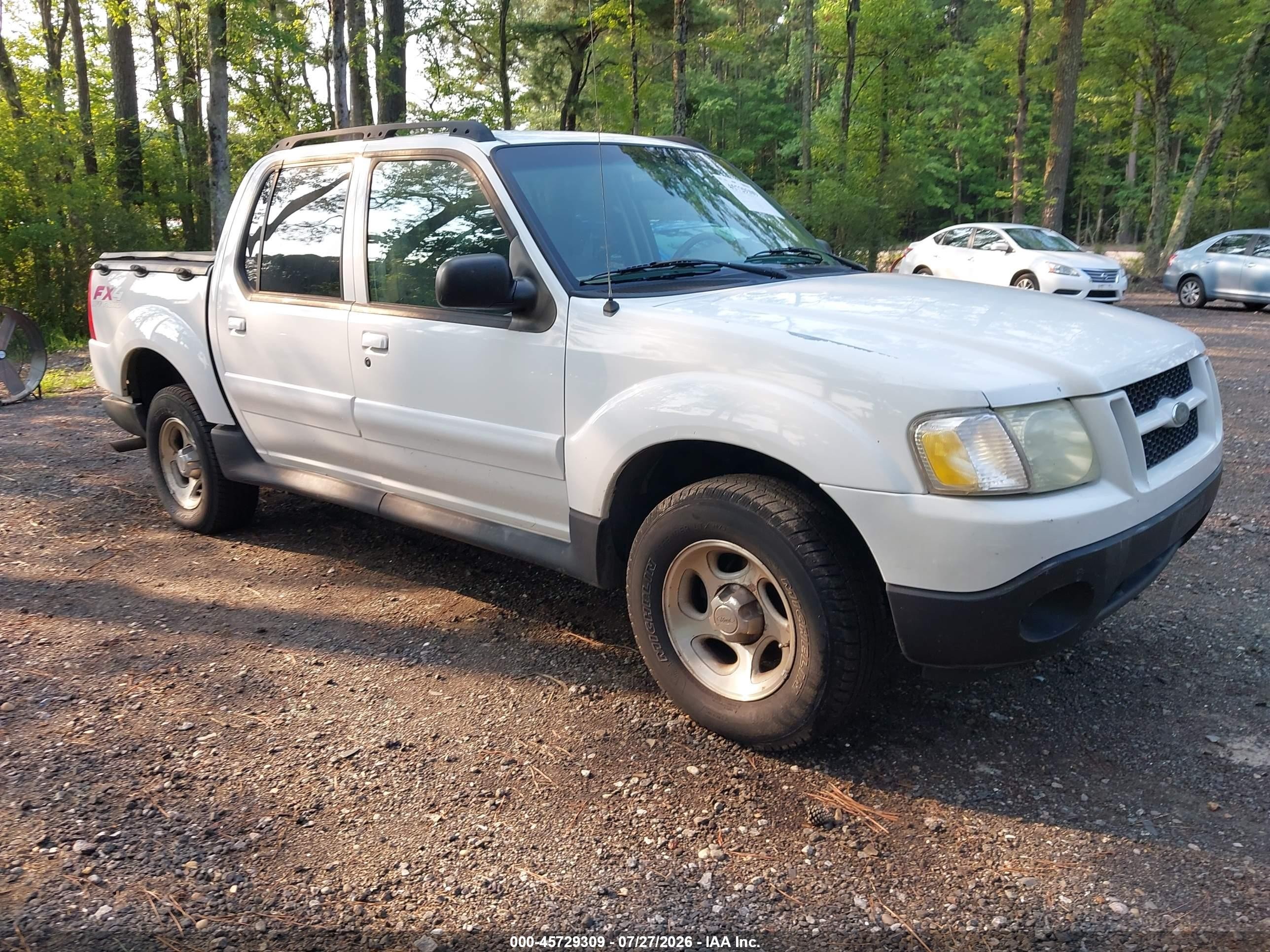 2003 Ford Explorer Sport Trac XLS, VIN 1FMZU77E83UC25975 — Зад