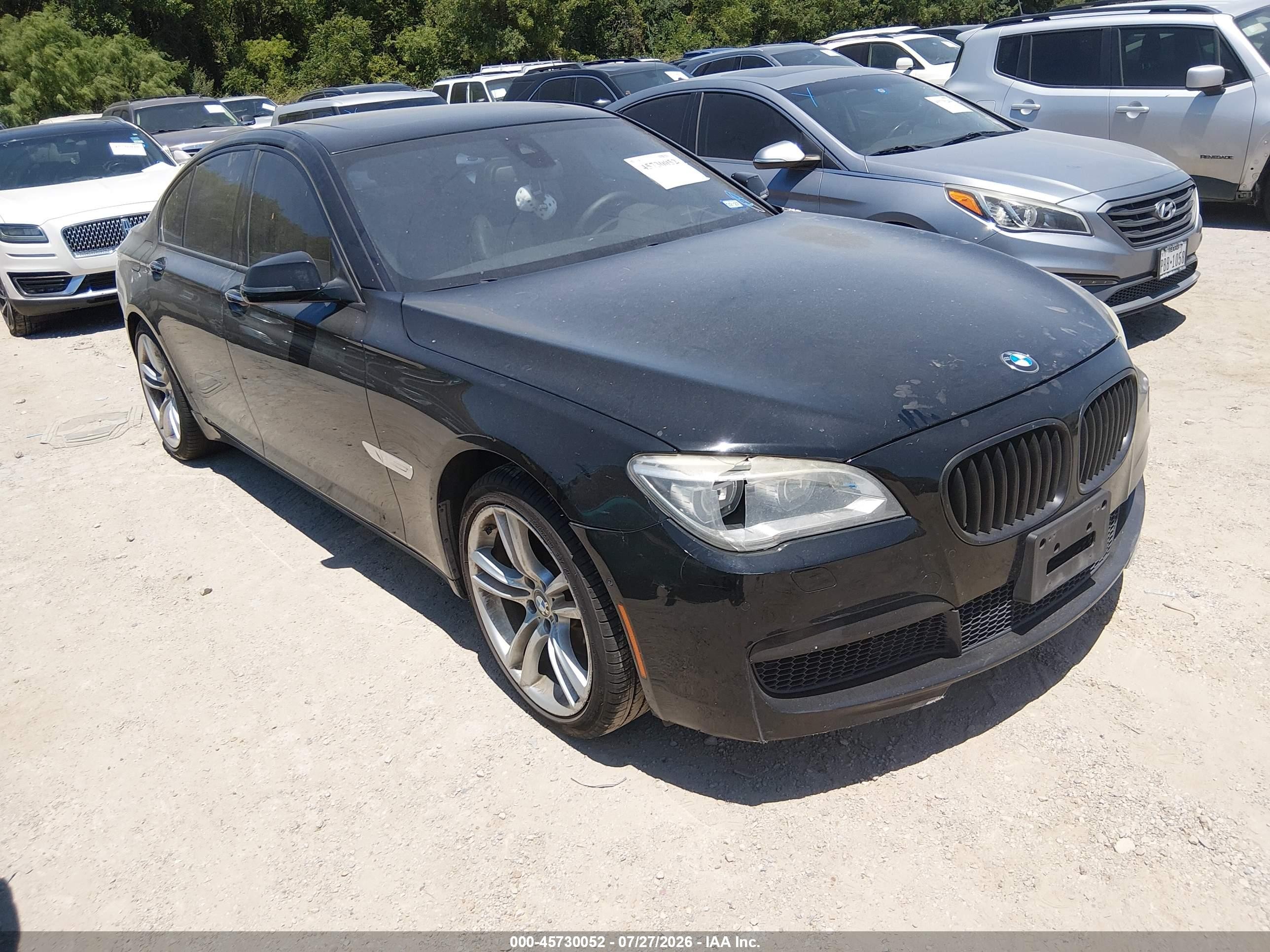 2014 BMW 7 Series 740i, VIN WBAYA6C58ED144516 — Normal wear