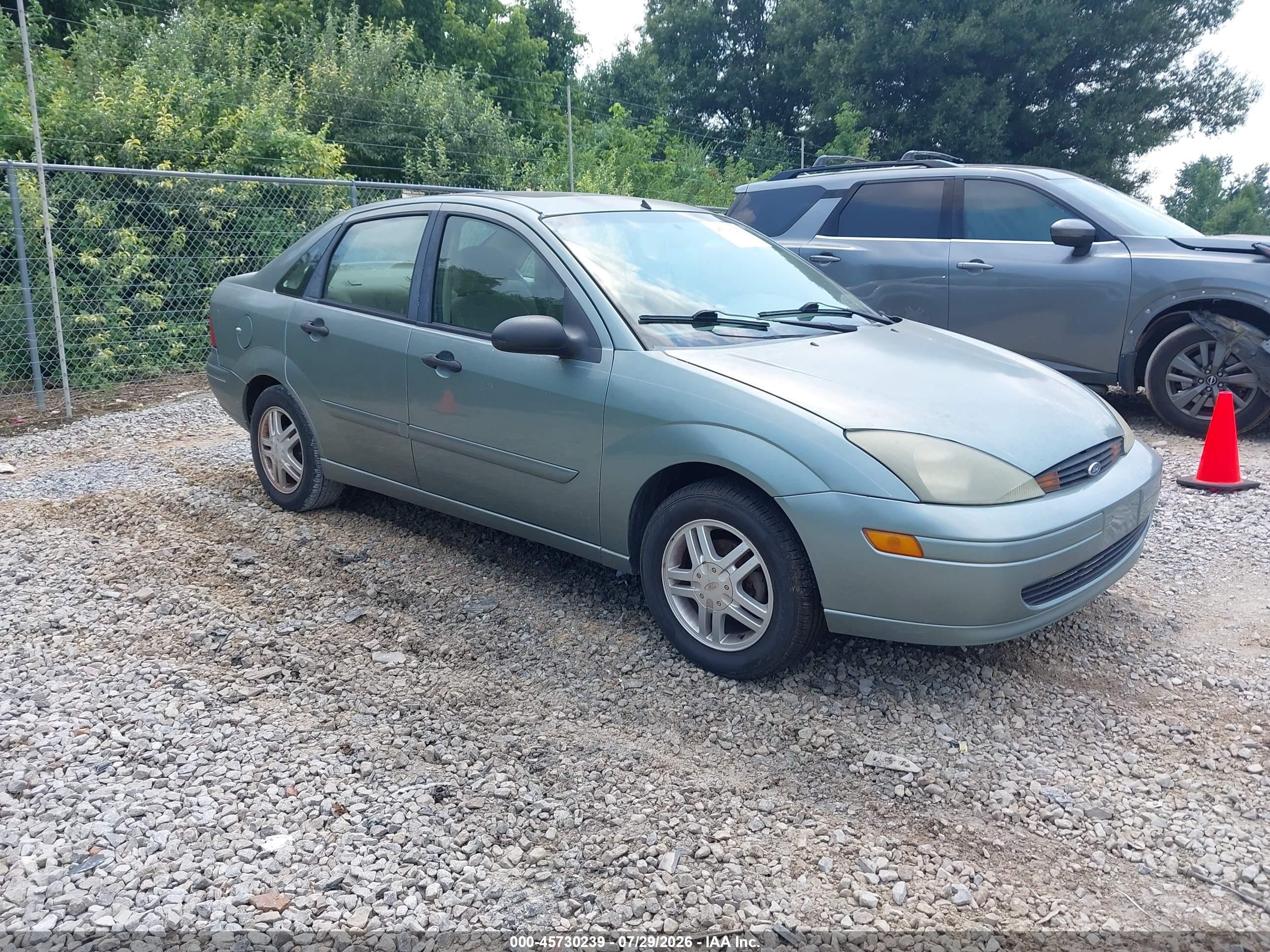 2003 Ford Focus SE, VIN 1FAFP34303W307235 — Normal wear