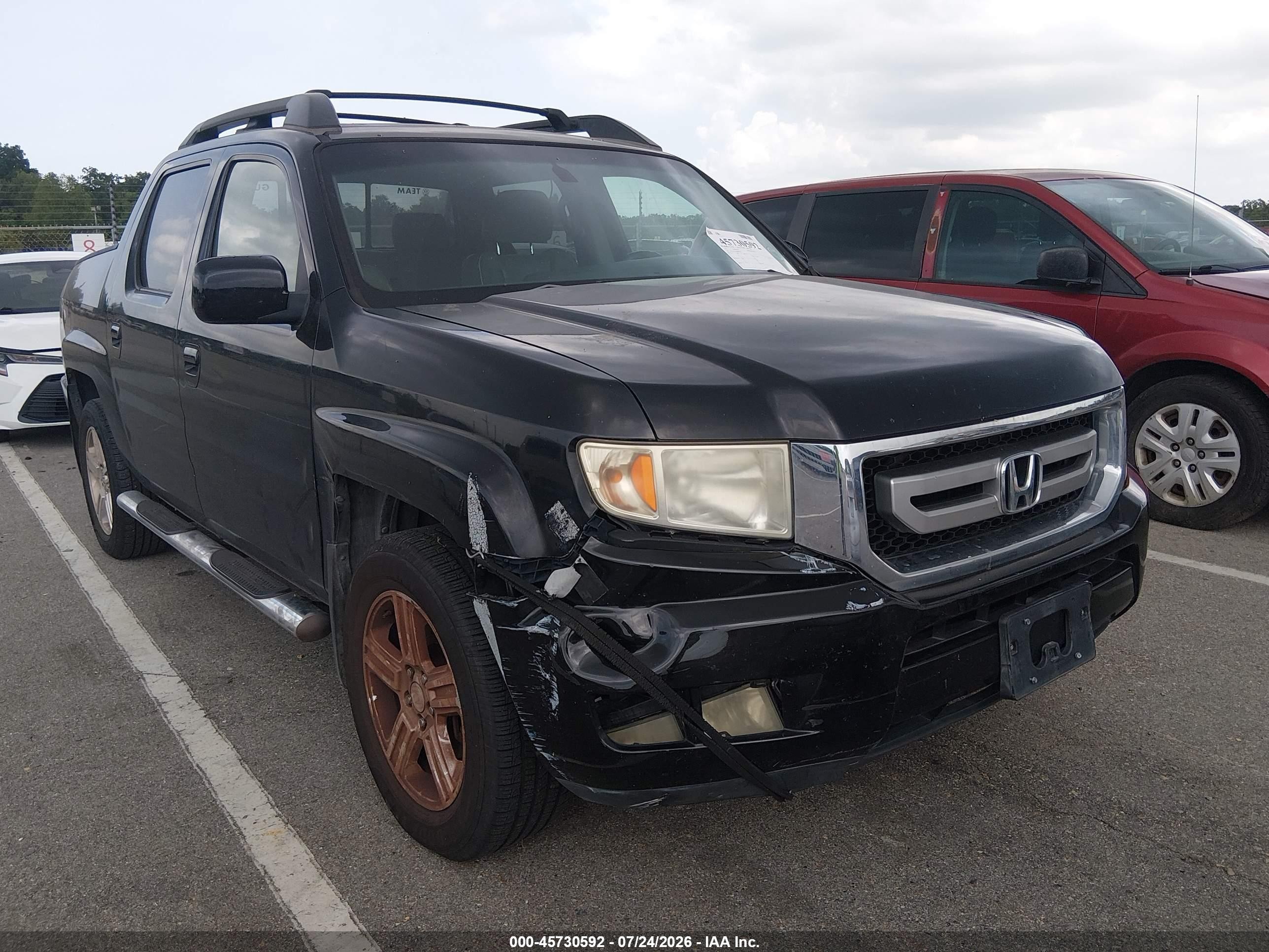 2011 Honda Ridgeline RTL, VIN 5FPYK1F55BB008323 — Front end
