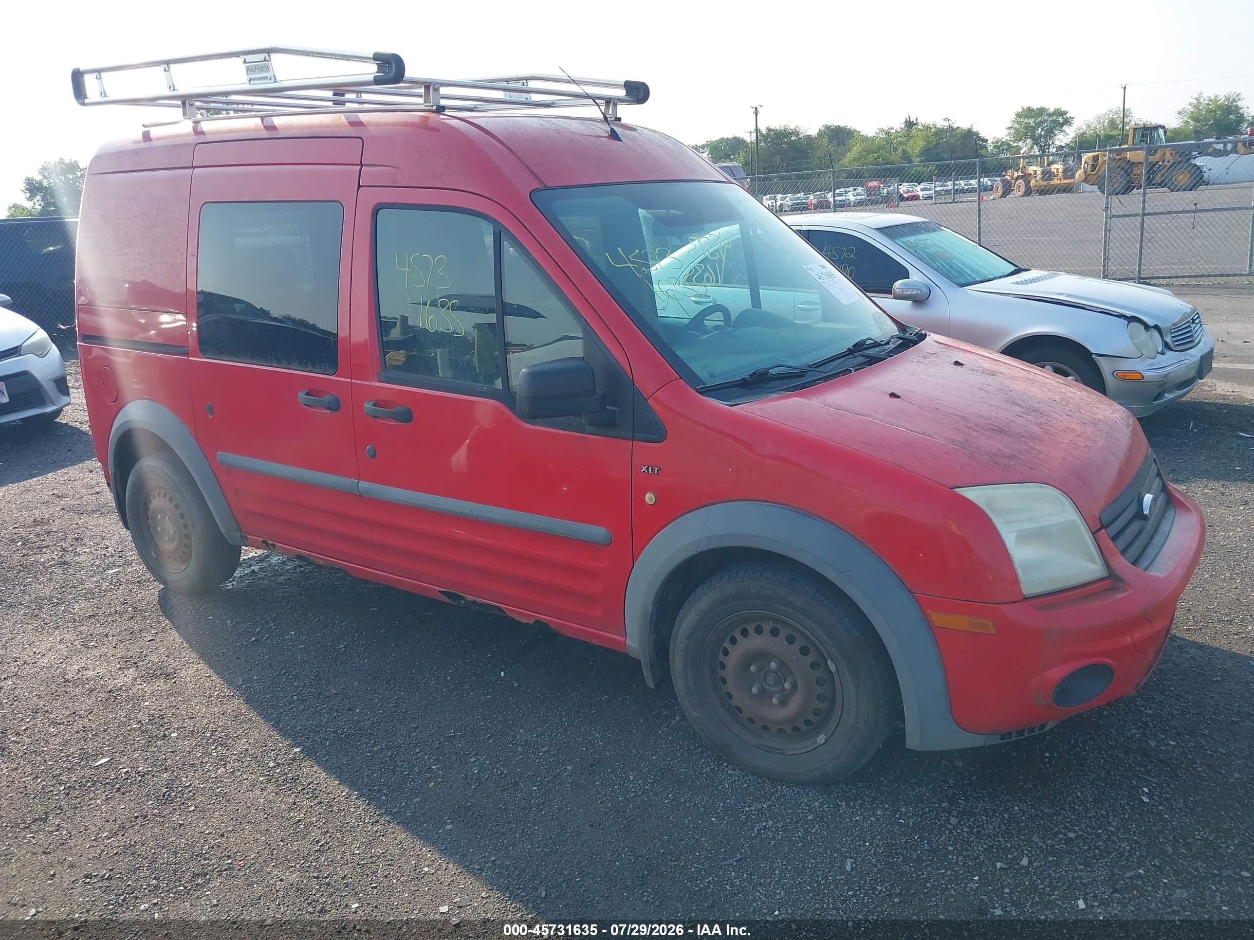 2010 Ford Transit Connect XLT, VIN NM0KS9BN9AT027047 — Normal wear