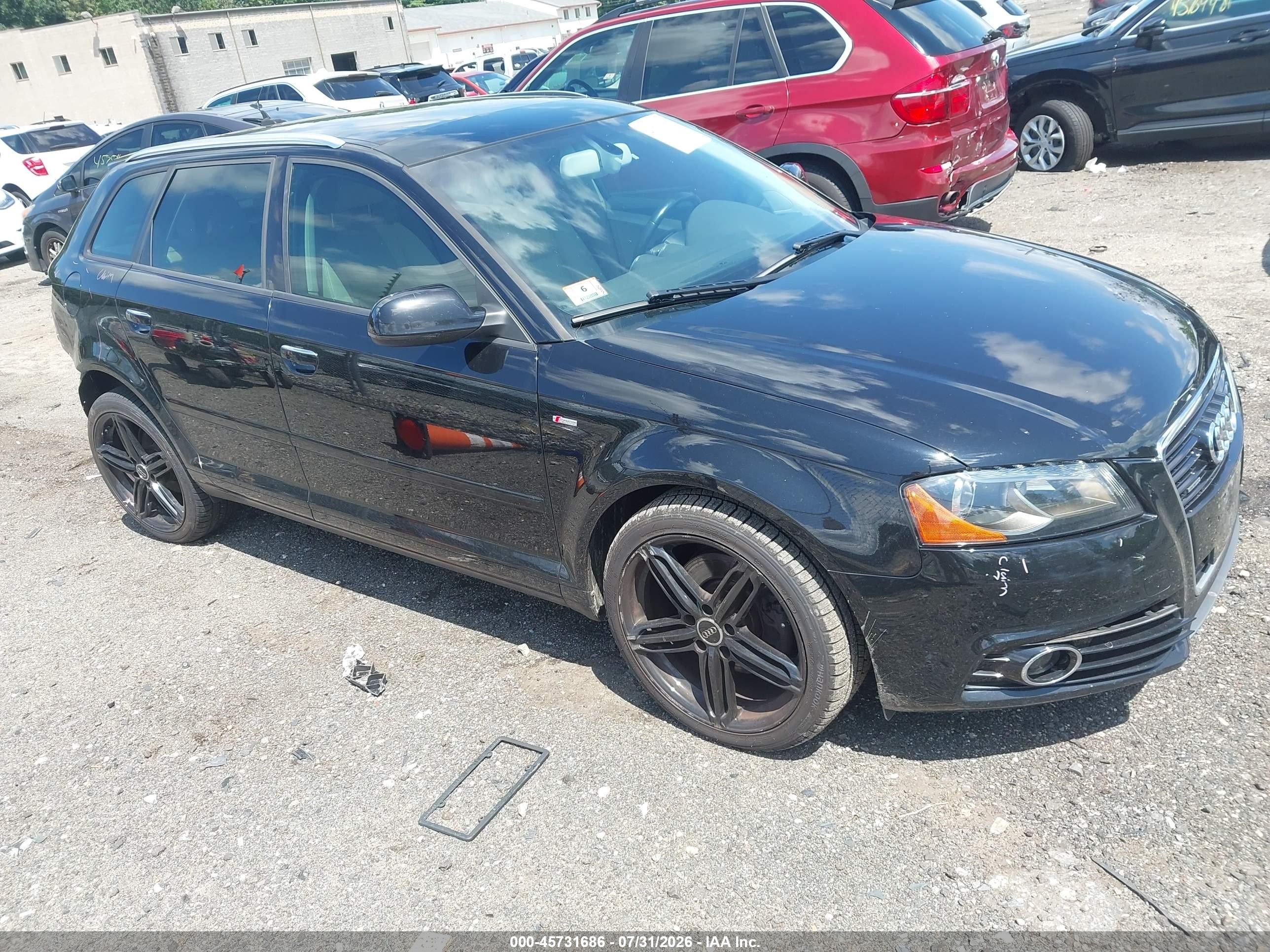 2012 Audi A3 Premium Plus, VIN WAUMFAFM2CA063936 — Зад