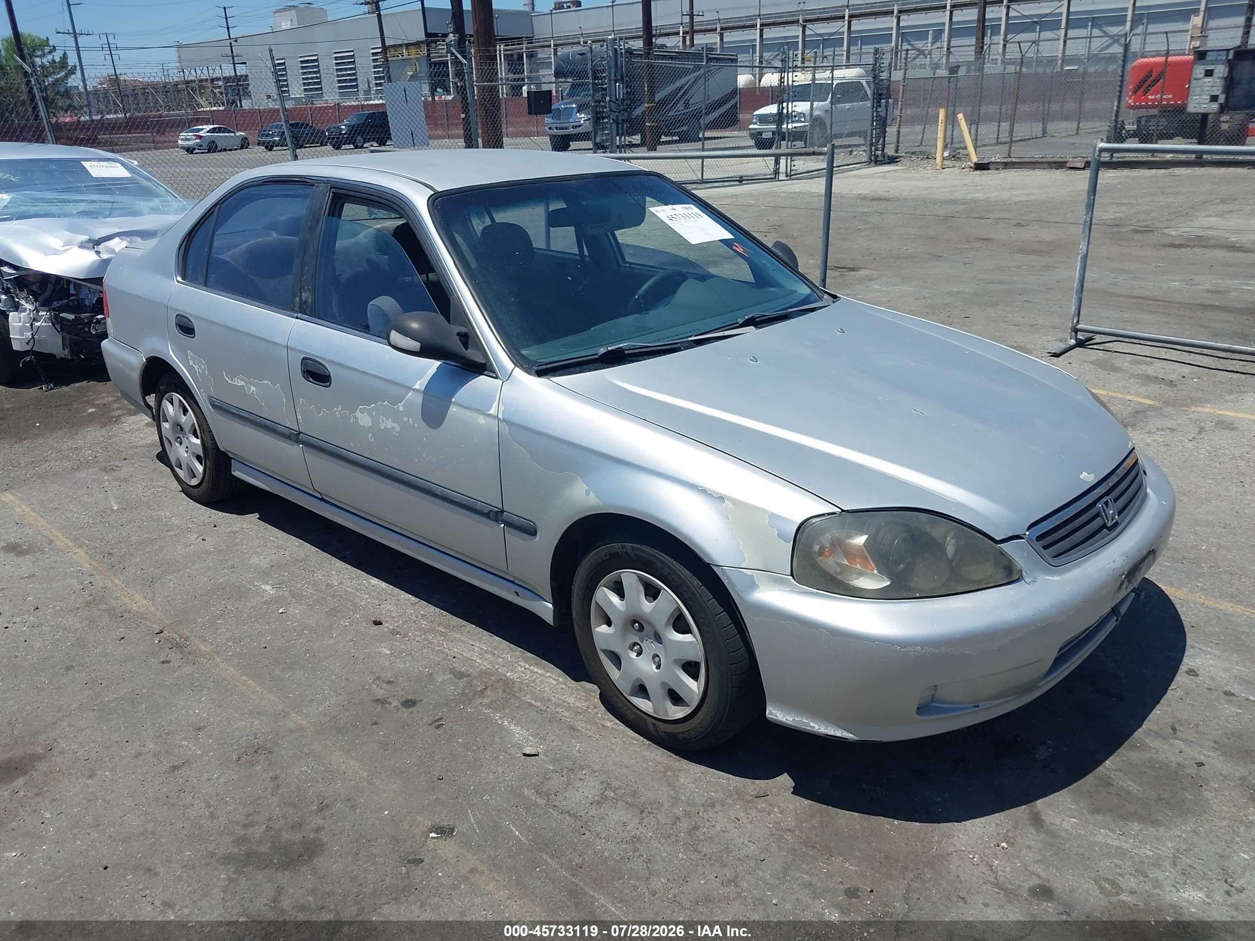 1999 Honda Civic LX, VIN 2HGEJ6671XH500248 — Side