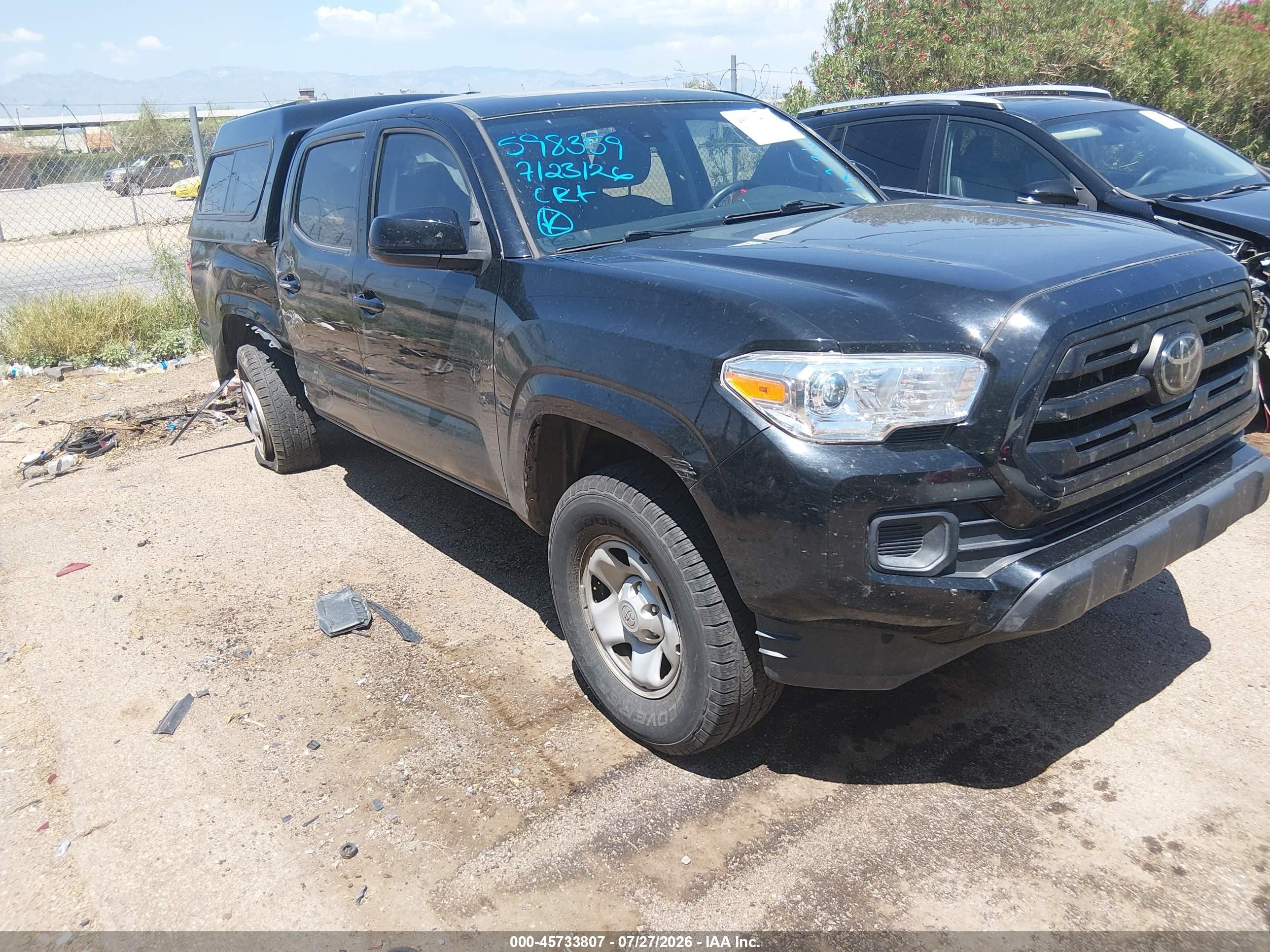 2018 Toyota Tacoma SR5, VIN 5TFAX5GN0JX123613 — Зад