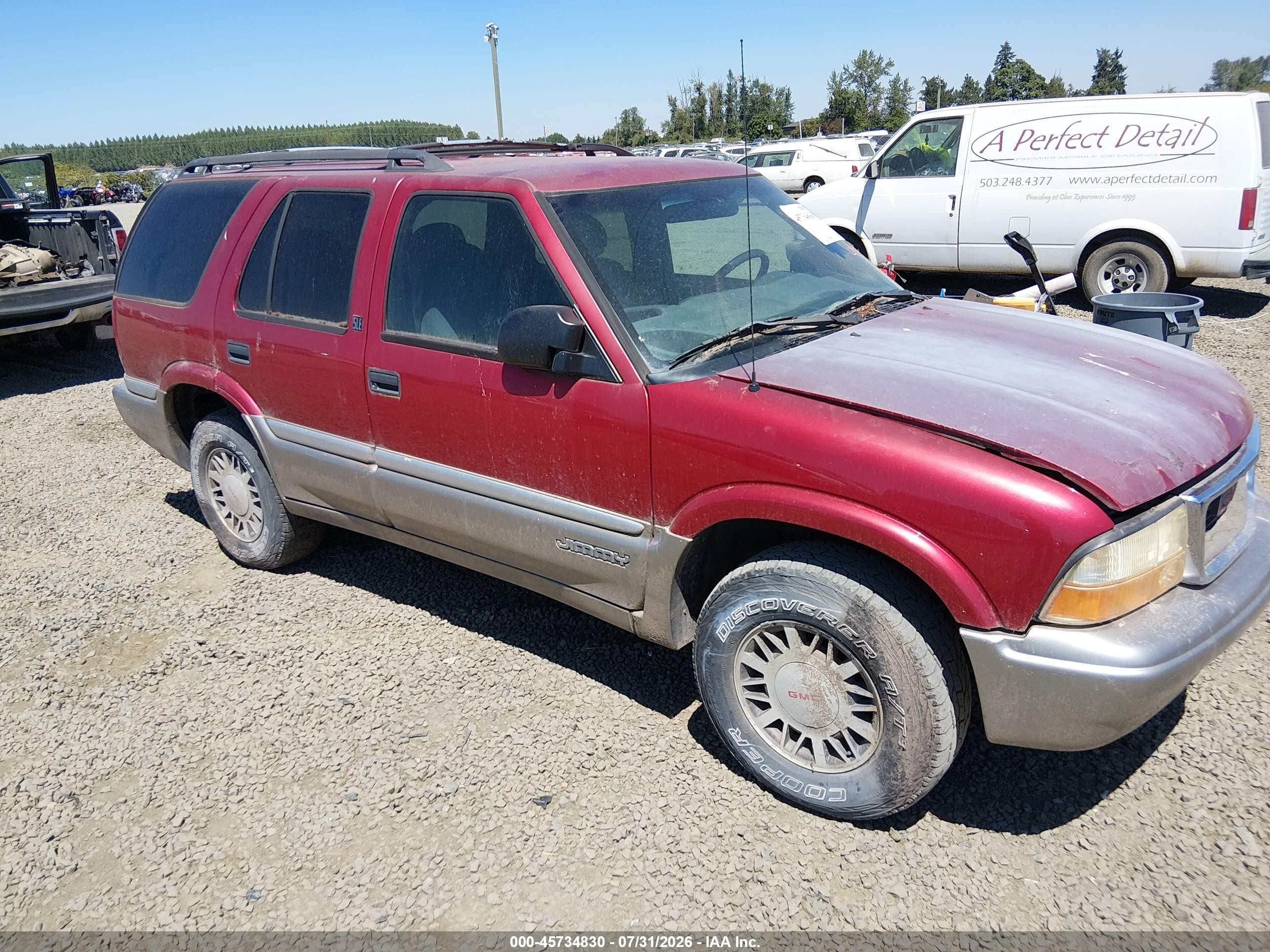 2000 GMC Jimmy SLT Convenience, VIN 1GKDT13W2Y2282791 — Normal wear