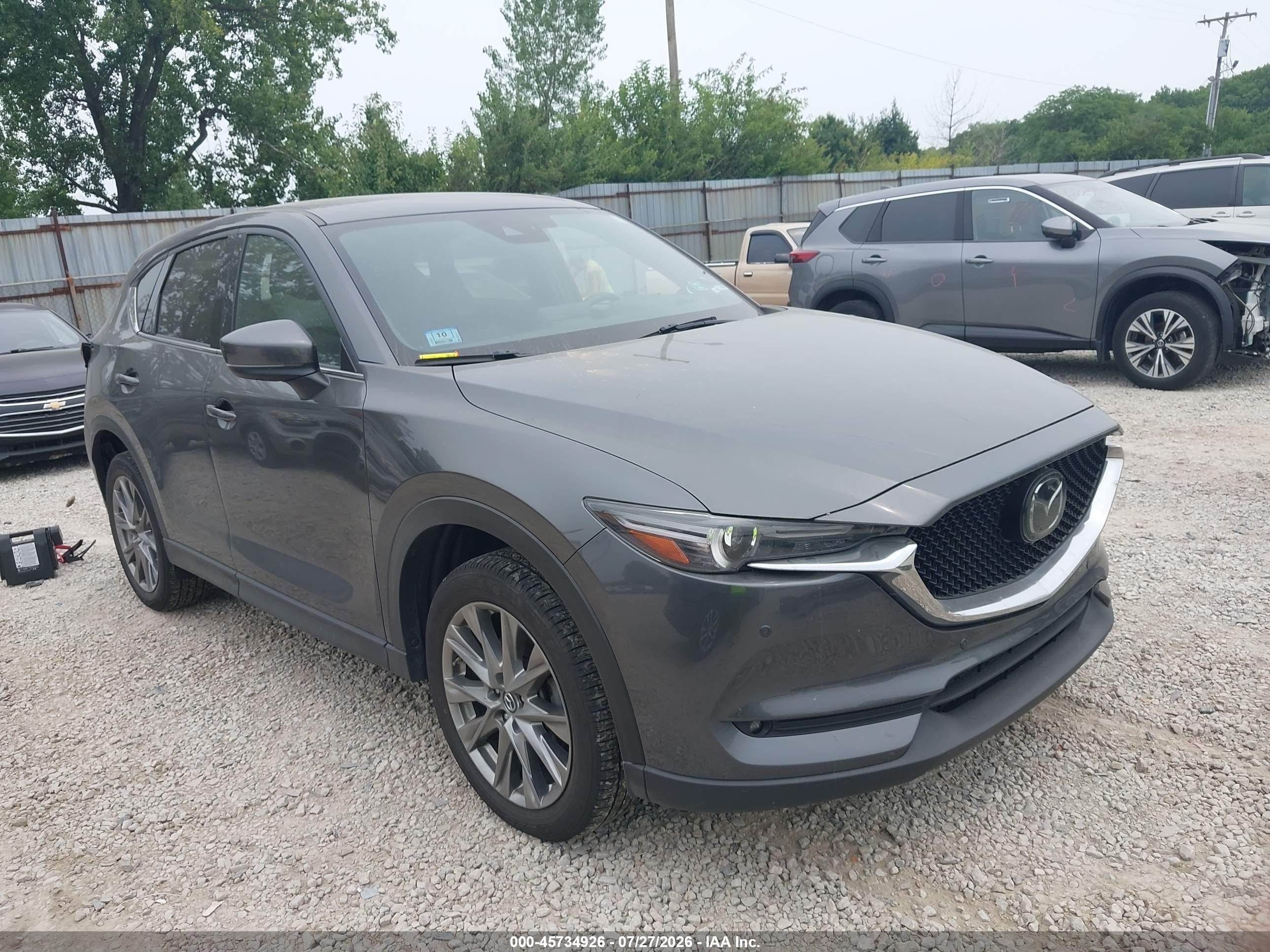 2020 Mazda CX-5 Signature, VIN JM3KFBEY3L0839525 — Normal wear