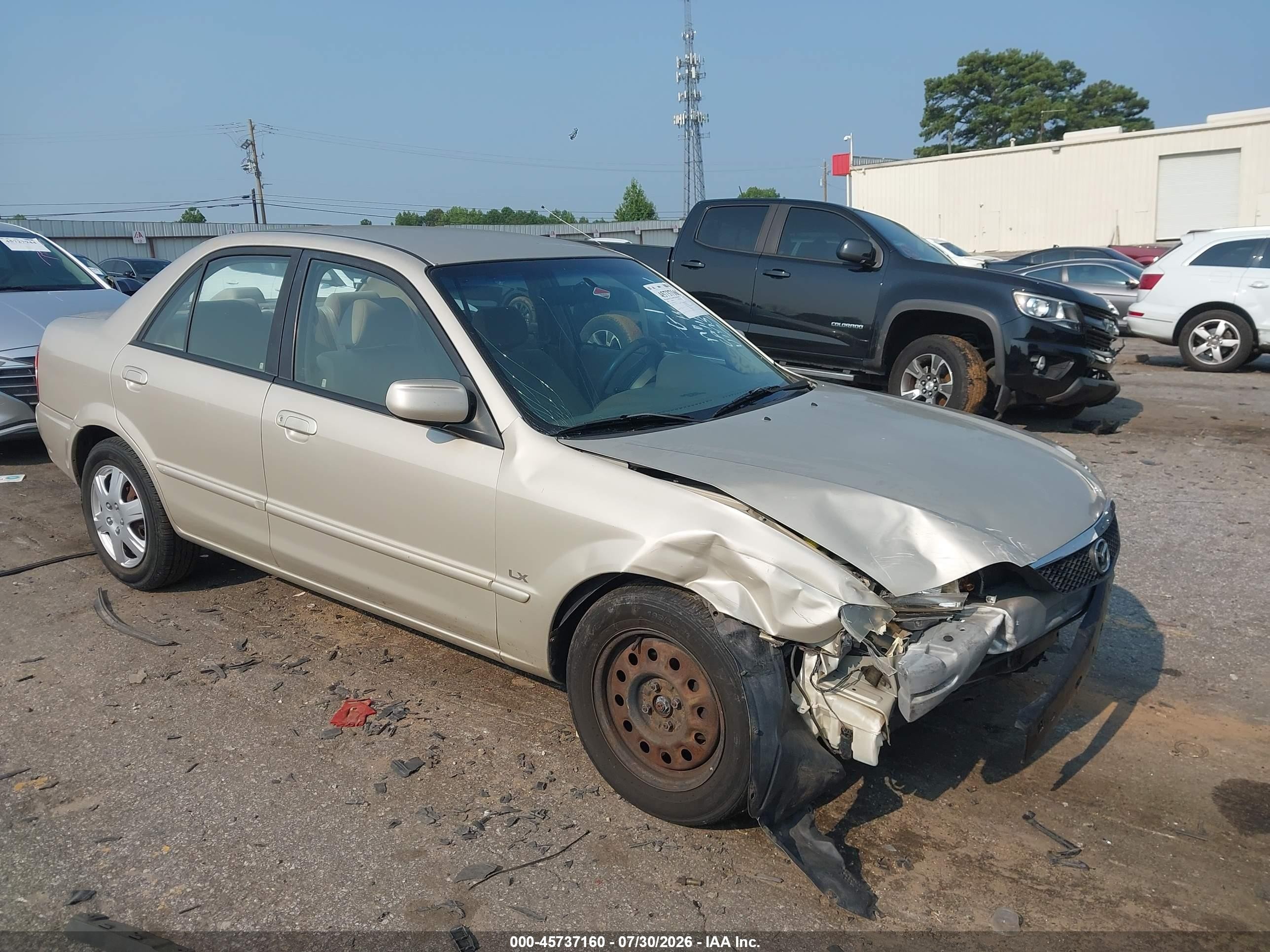 2002 Mazda Protege DX, VIN JM1BJ225520515735 — Перед