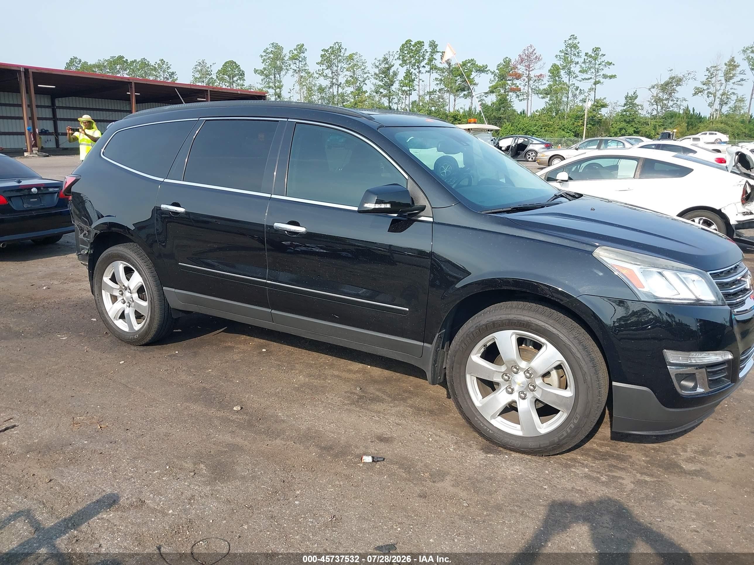 2016 Chevrolet Traverse LTZ, VIN 1GNKRJKD6GJ320309 — Rear end