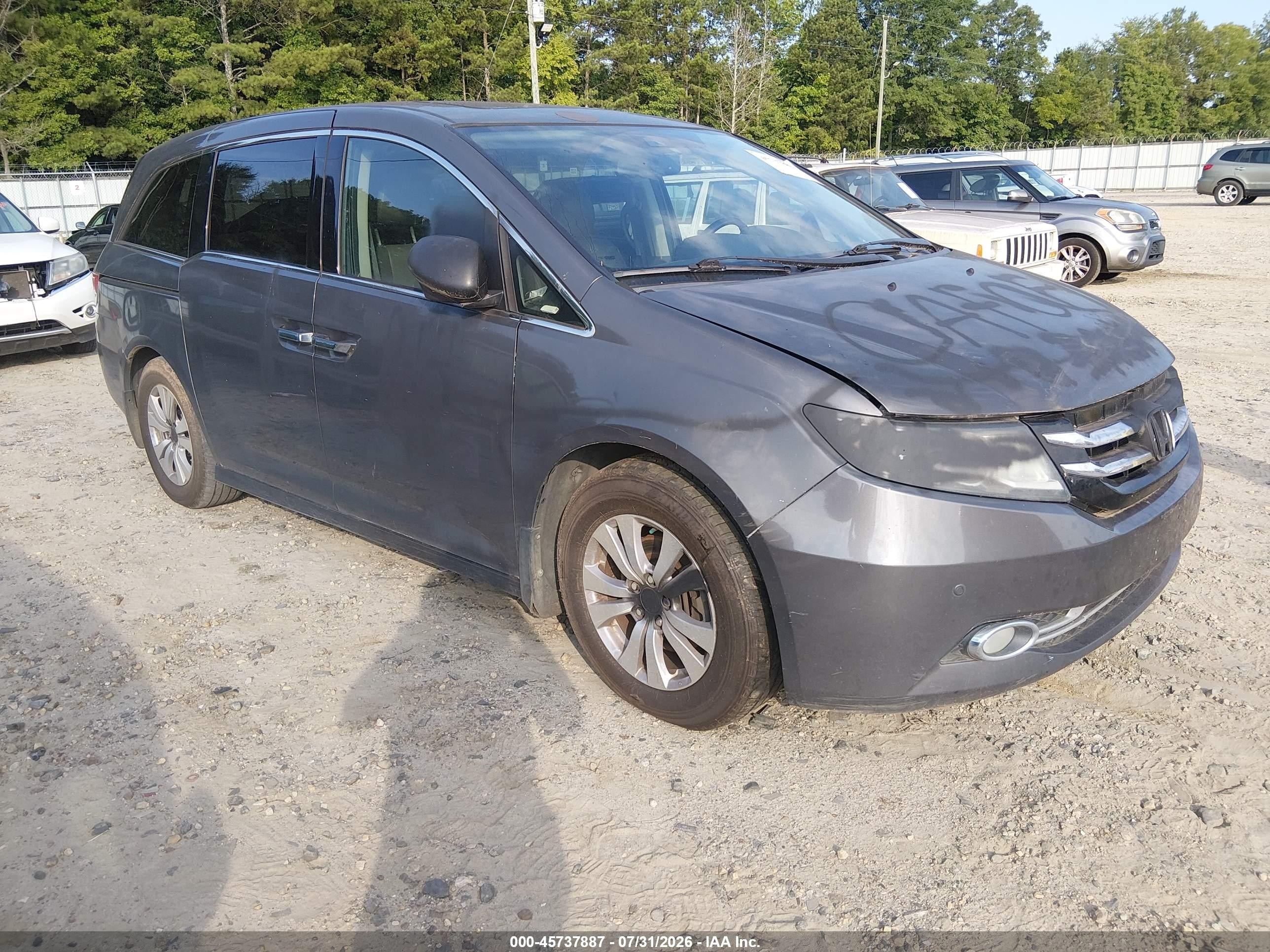 2014 Honda Odyssey Touring, VIN 5FNRL5H99EB004944 — Normal wear
