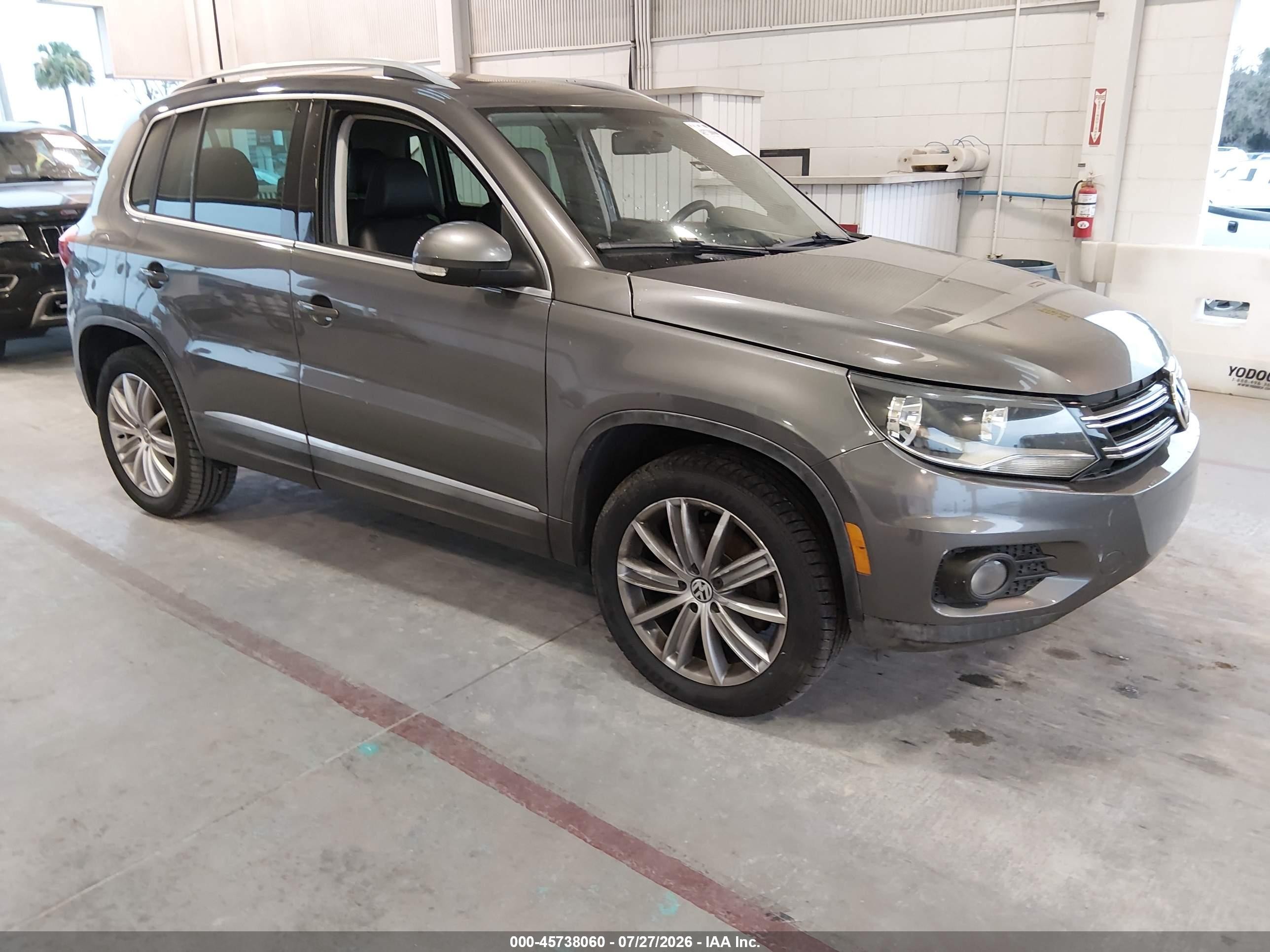 2012 Volkswagen Tiguan S, VIN WVGAV7AX7CW000696 — Vandalism