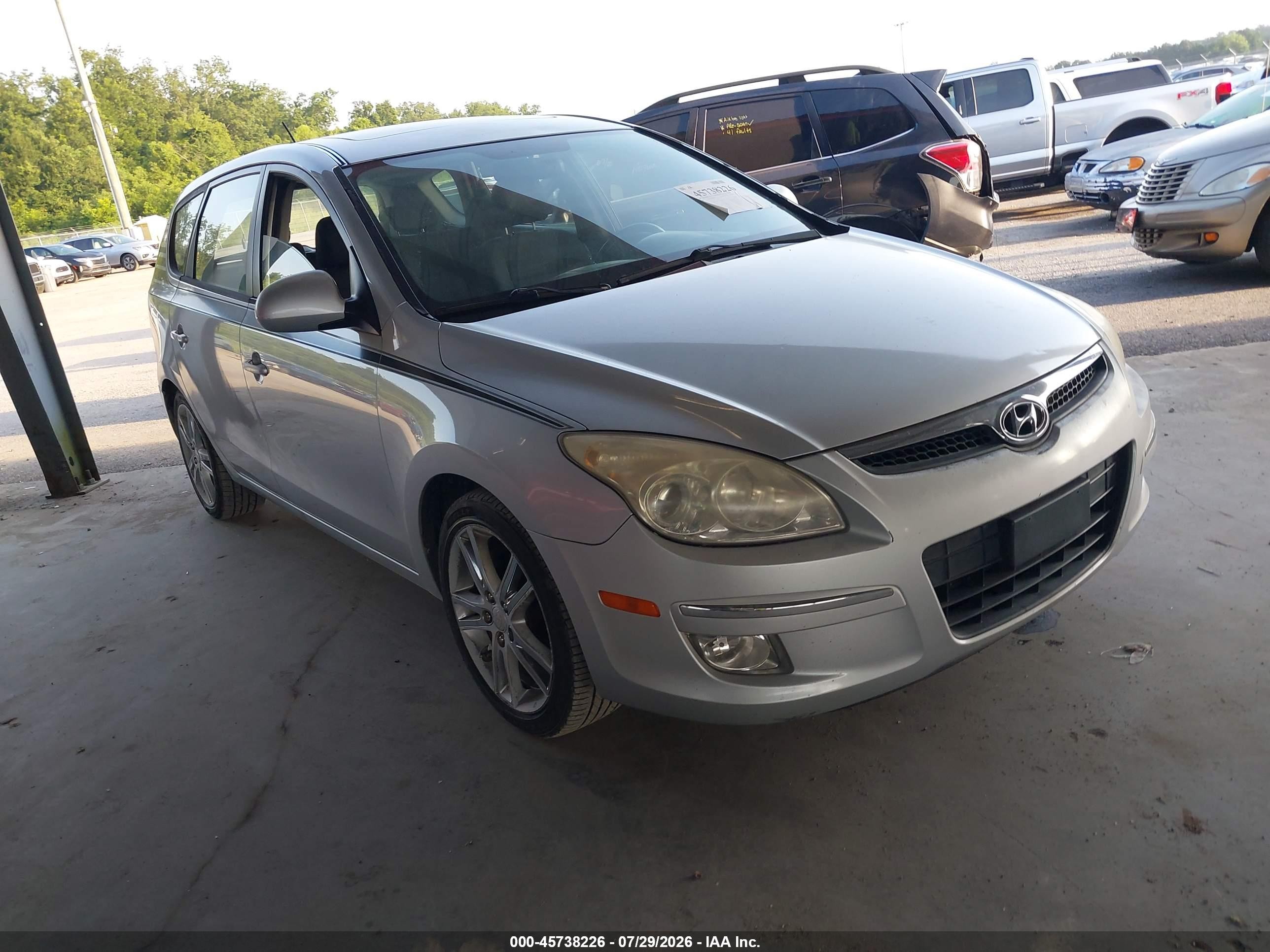 2009 Hyundai Elantra Touring, VIN KMHDC86E89U037678 — Normal wear