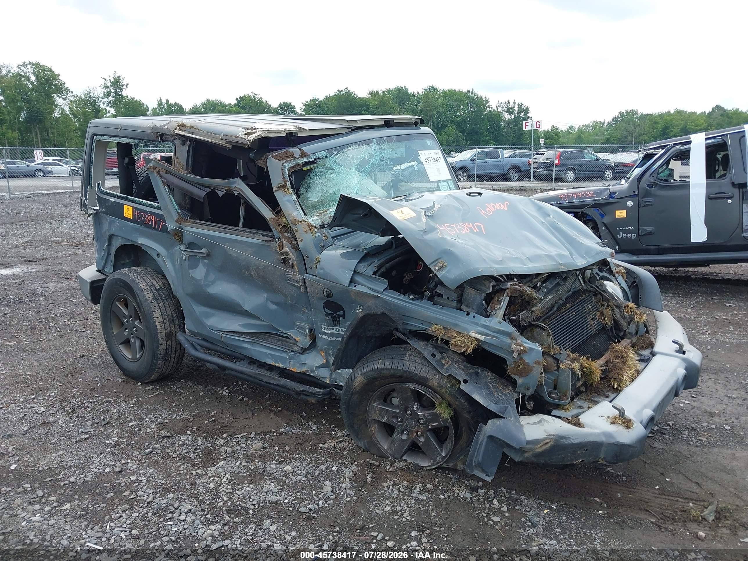 2015 Jeep Wrangler Freedom Edition, VIN 1C4AJWAG2FL729799 — Rollover