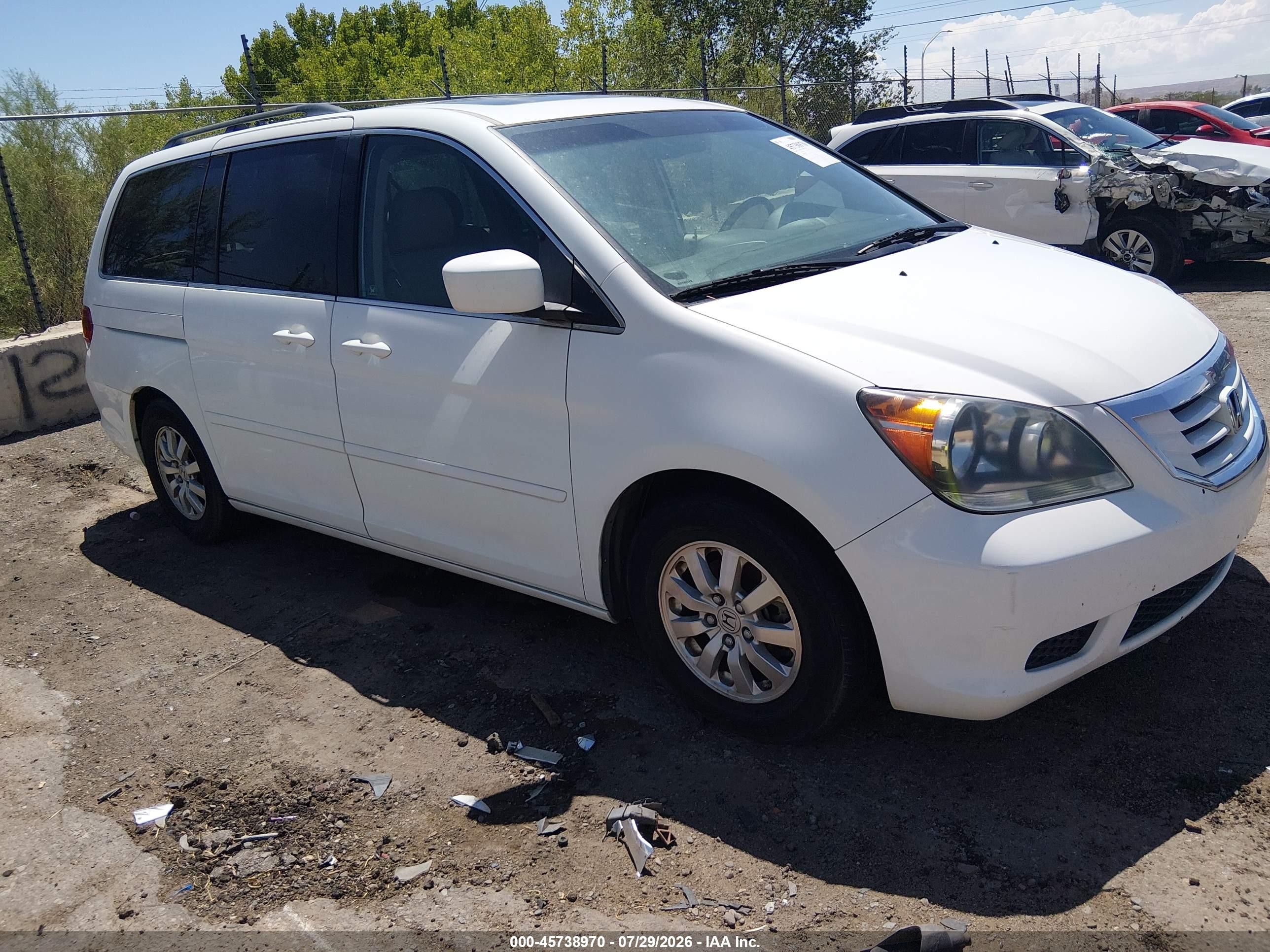 2010 Honda Odyssey EX-L, VIN 5FNRL3H60AB062879 — Front end